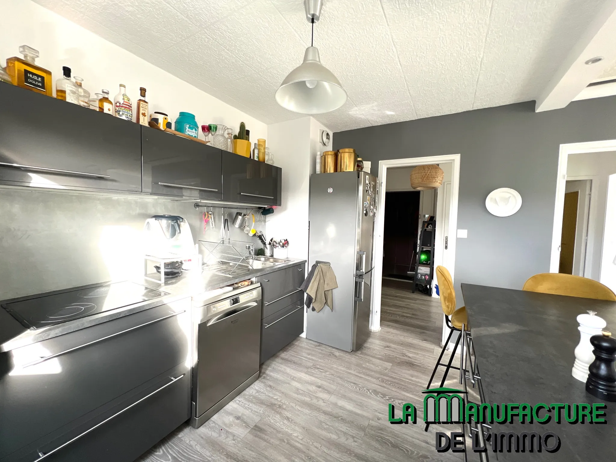 Appartement F3 avec balcon, cave et parking à Saint-Étienne 