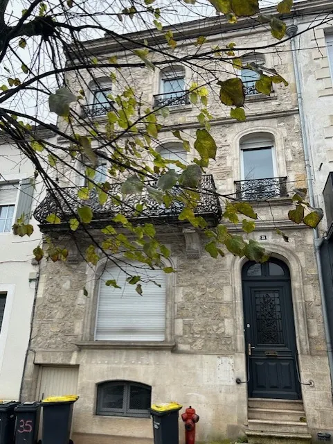 Immeuble de rapport à Marmande avec espace commercial et appartement