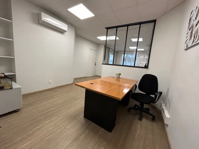 Immeuble de rapport à Marmande avec espace commercial et appartement 