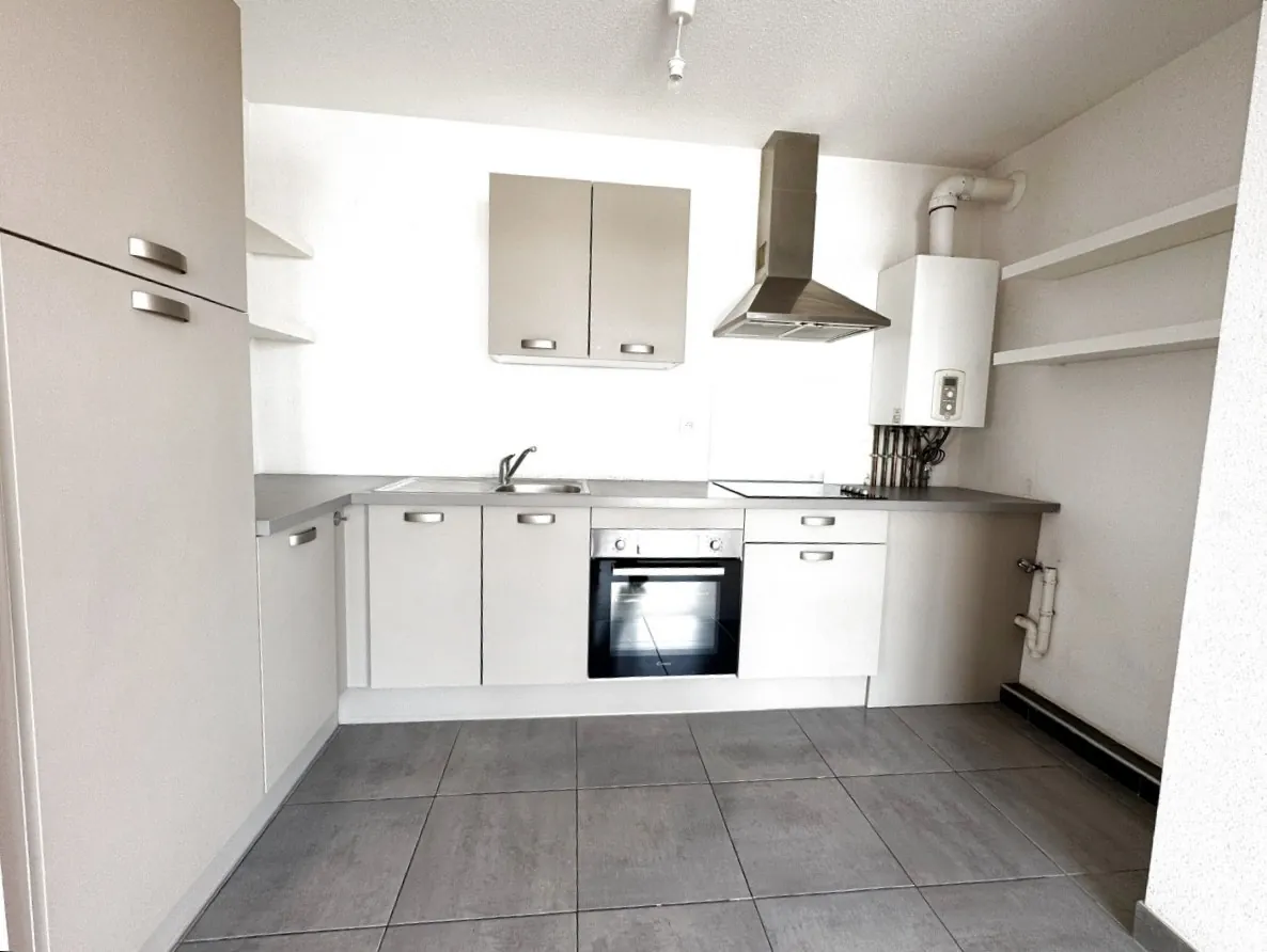 Appartement 2 pièces lumineux de 51,89 m² à Saint-Louis avec terrasse et parking 