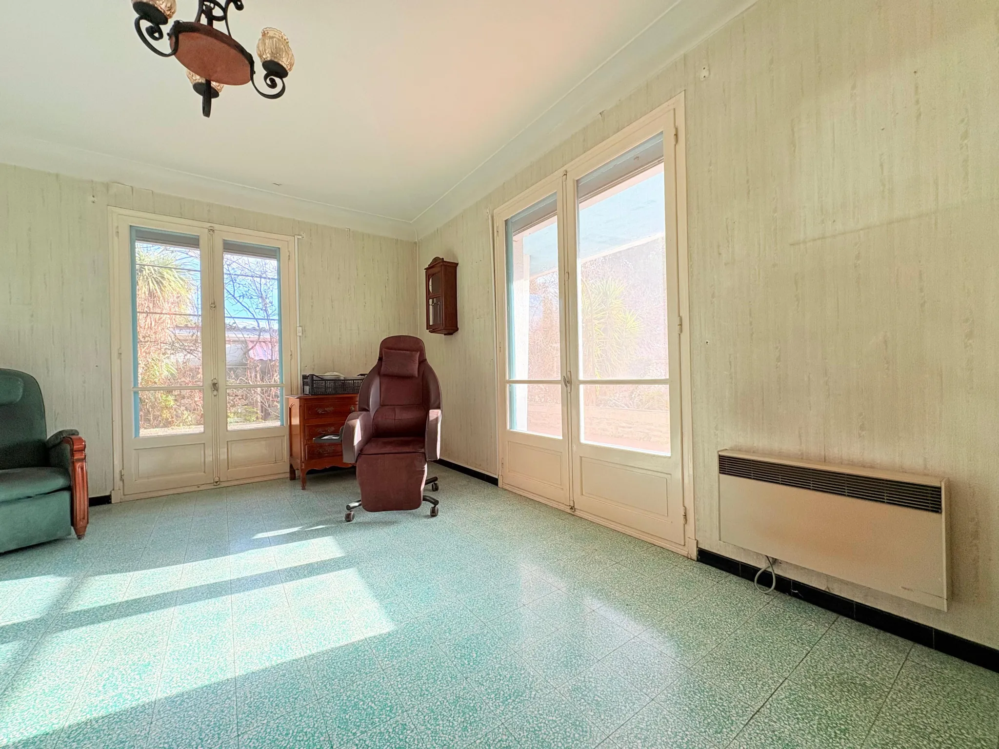 Maison de plain-pied à Thuir avec 4 chambres, garage et terrain de 670 m² 