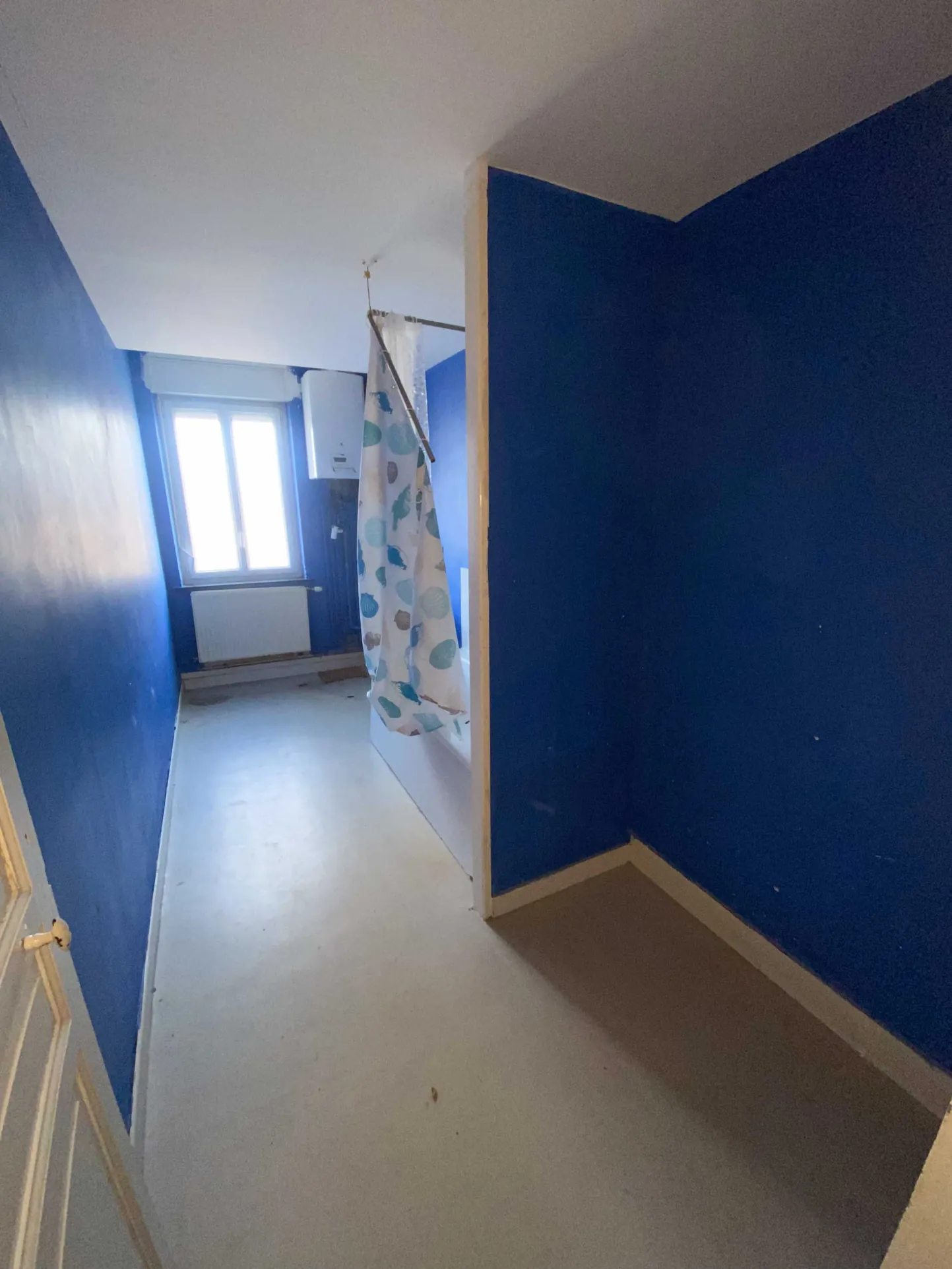 Maison à vendre à Jeumont avec 2 chambres, cour et grenier aménageable 