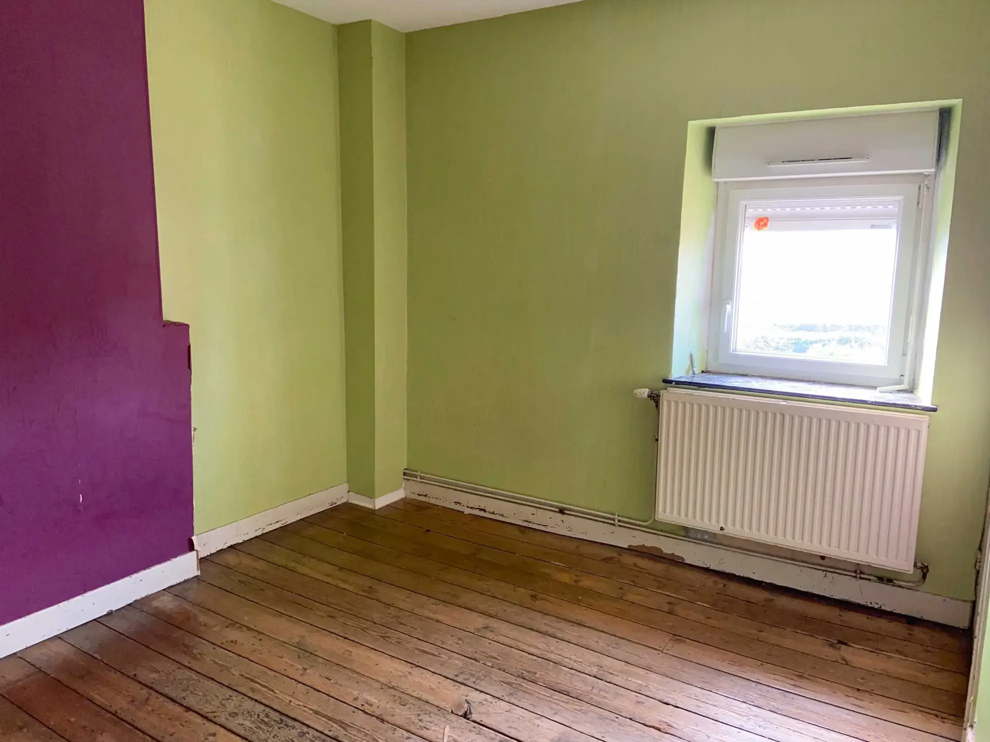 Maison à vendre à Jeumont avec 2 chambres, cour et grenier aménageable 