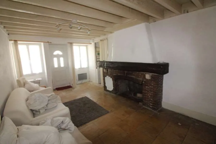 À vendre à Tannay : Deux maisons jumelées avec potentiel, proche commerces 