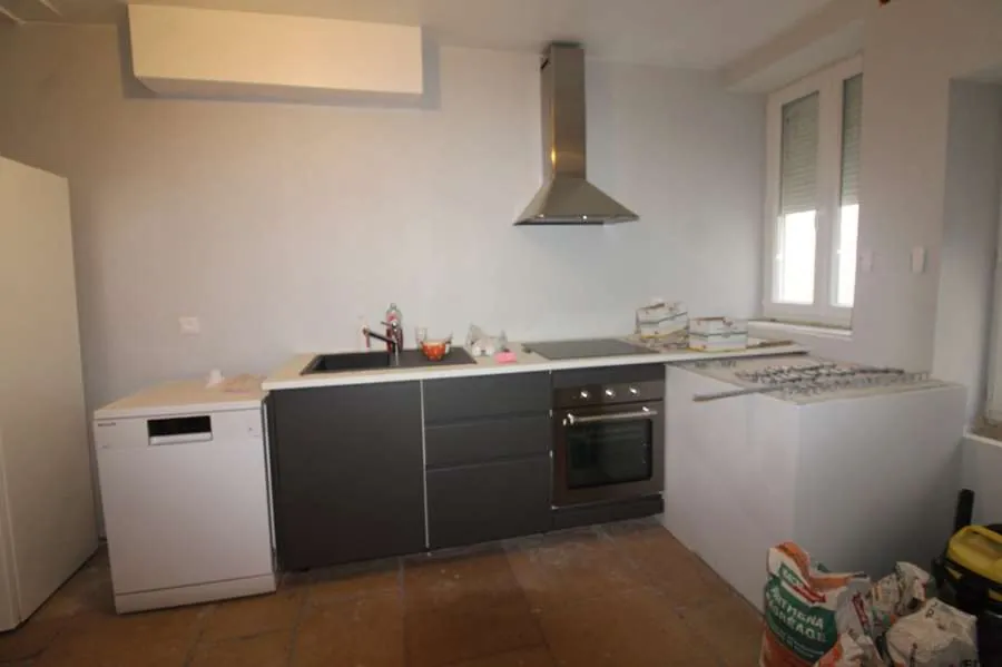 À vendre à Tannay : Deux maisons jumelées avec potentiel, proche commerces 