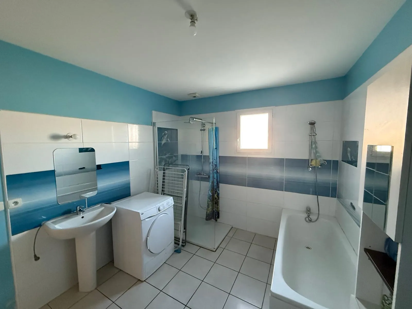 Maison de plain-pied à vendre à Saint-Pierre-des-Nids avec garage et locataire 