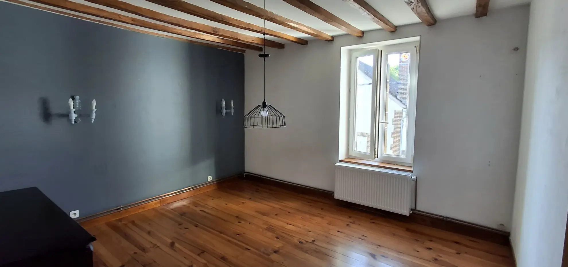 Maison de 94 m² à Migennes avec jardin, garage et potentiel d’extension 