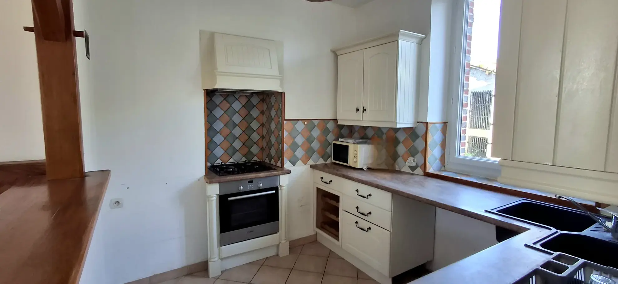 Maison de 94 m² à Migennes avec jardin, garage et potentiel d’extension 