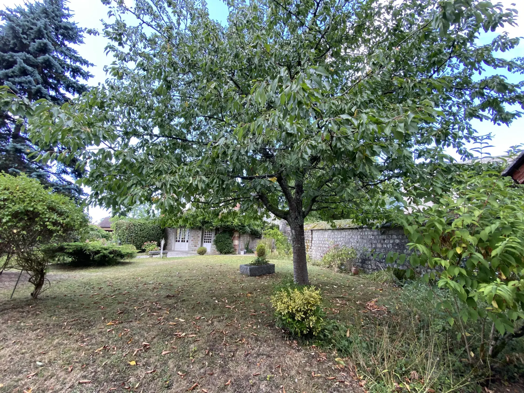 Villa lumineuse avec jardin et parking privé à La Ferté Macé - Opportunité à ne pas manquer 