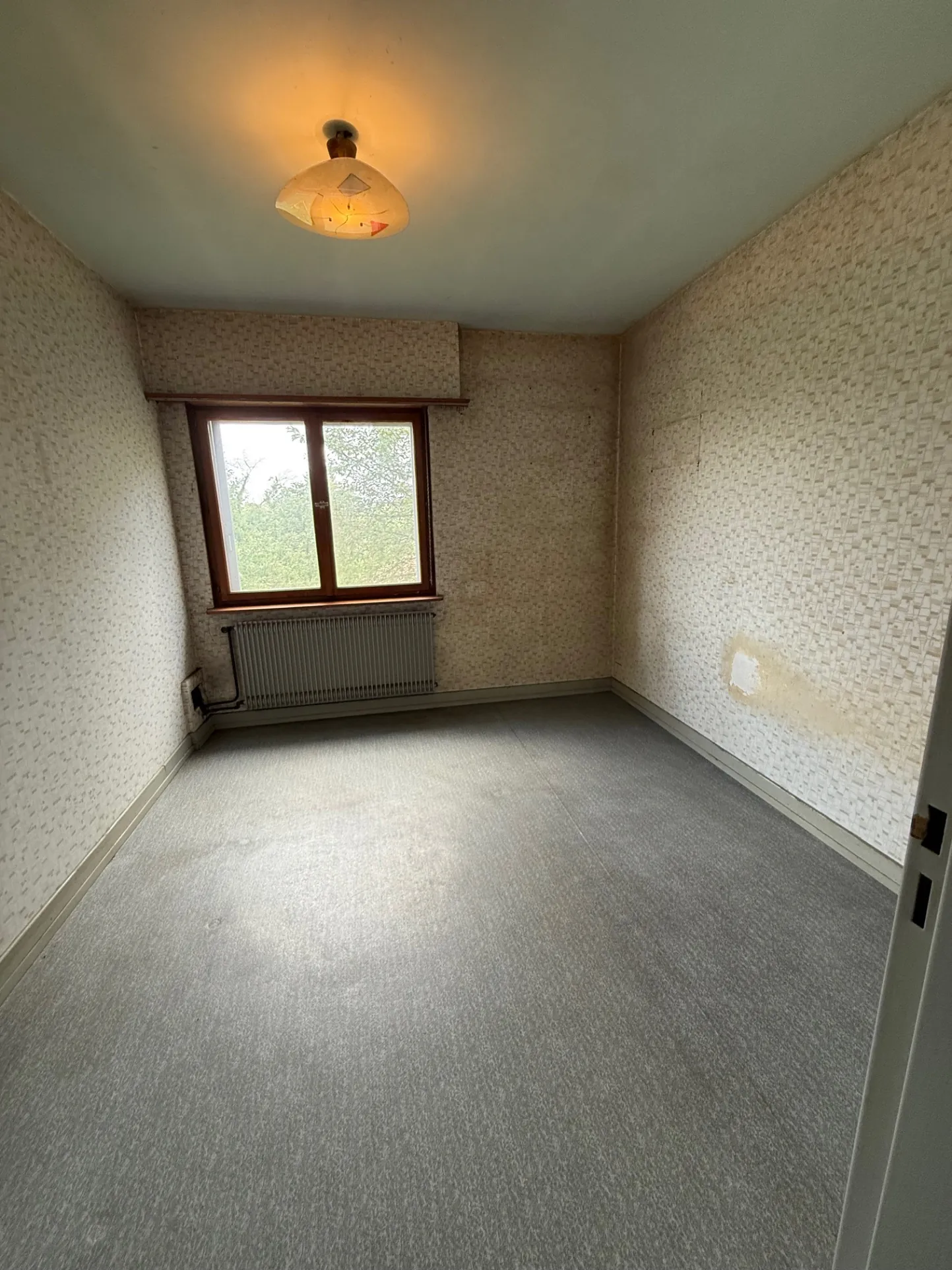 Maison à rénover à Zillisheim avec garage et jardin sur 5.59 ares 