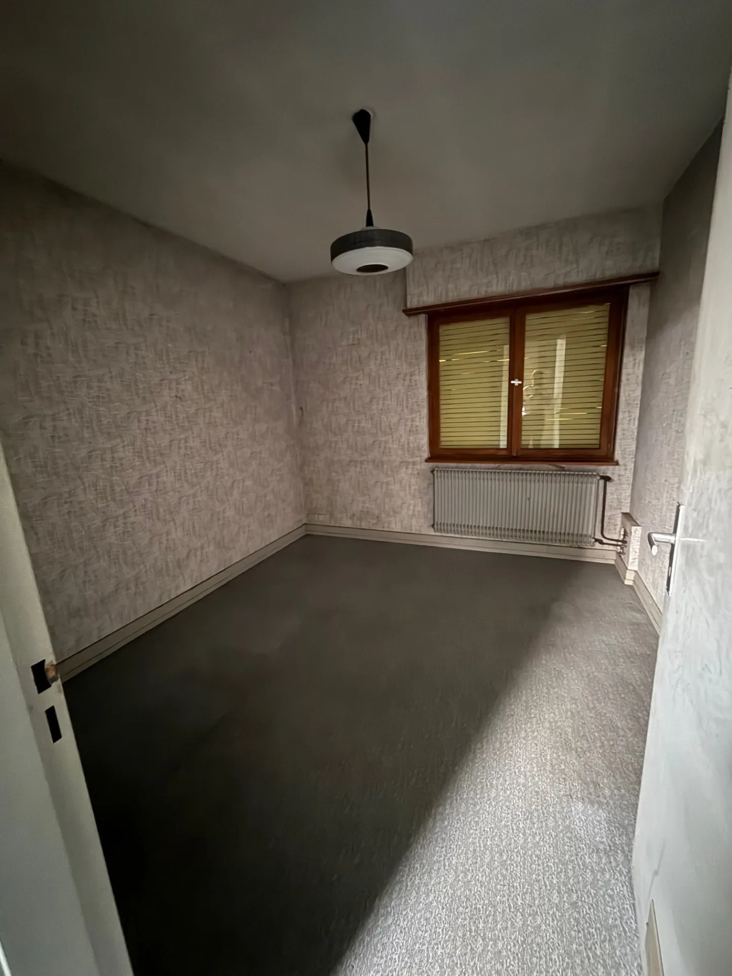 Maison à rénover à Zillisheim avec garage et jardin sur 5.59 ares 