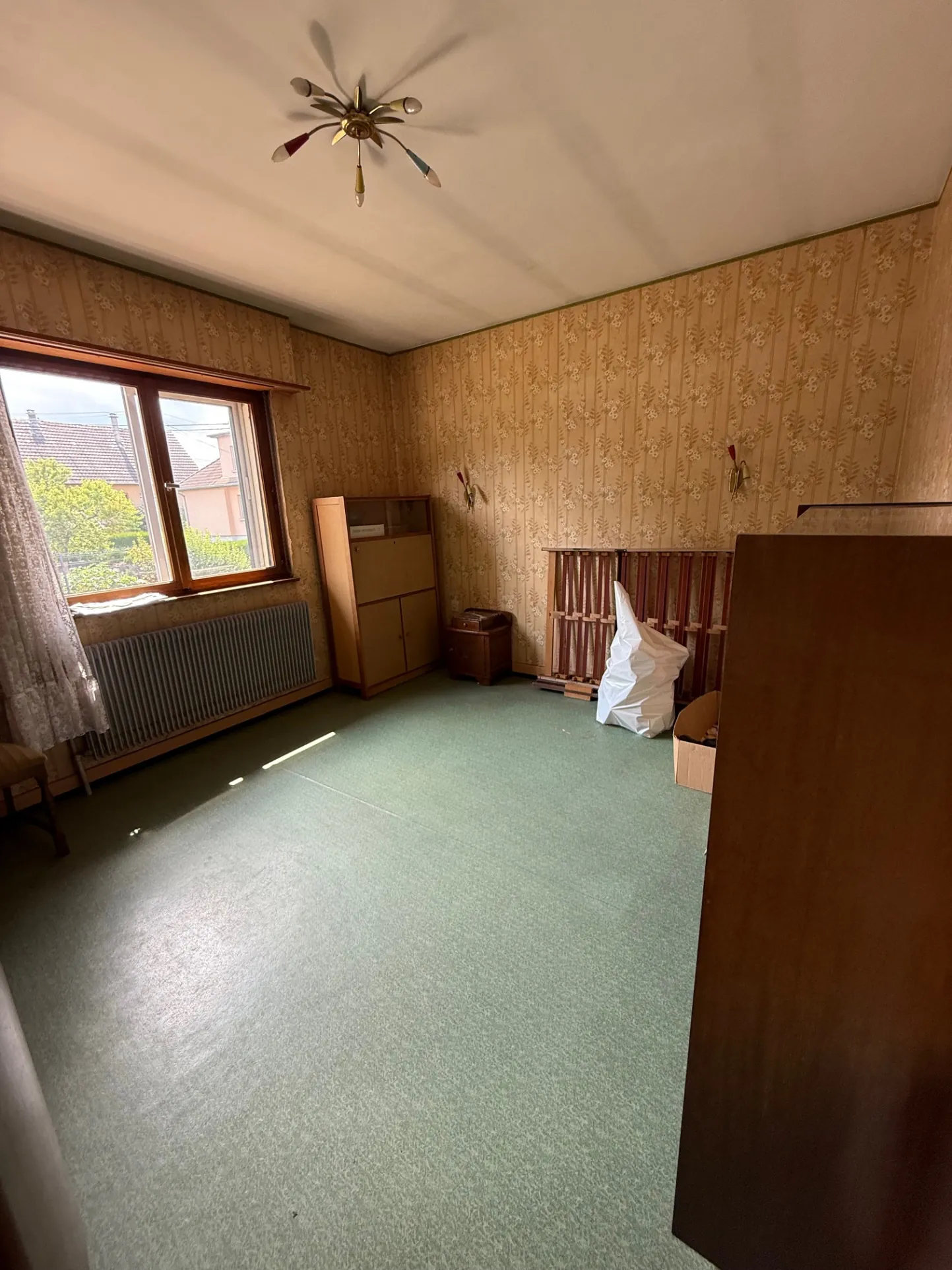 Maison à rénover à Zillisheim avec garage et jardin sur 5.59 ares 