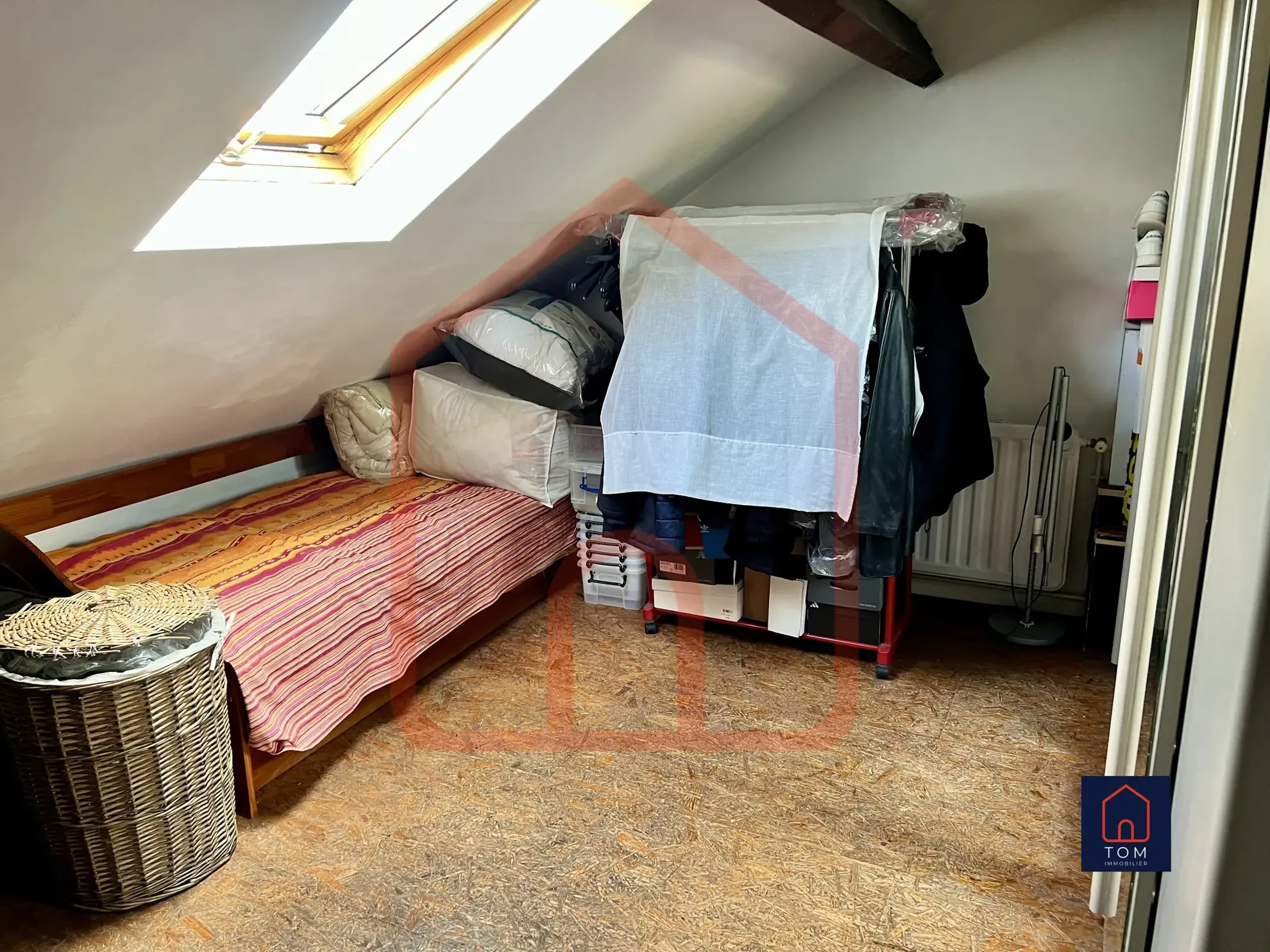 Maison des années 30 à vendre à Lezennes avec jardin, 3 chambres et sous-sol complet 