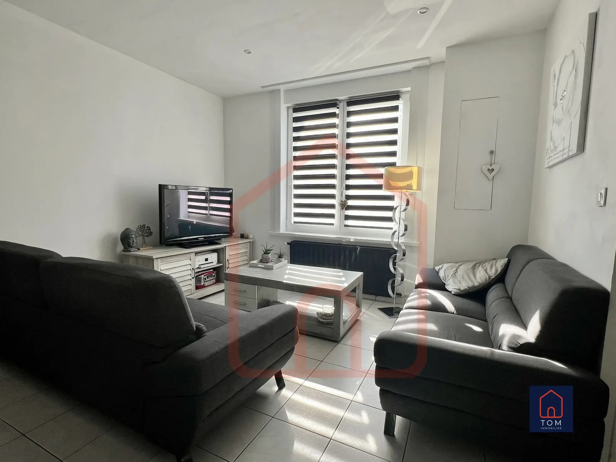 Maison des années 30 à vendre à Lezennes avec jardin, 3 chambres et sous-sol complet 