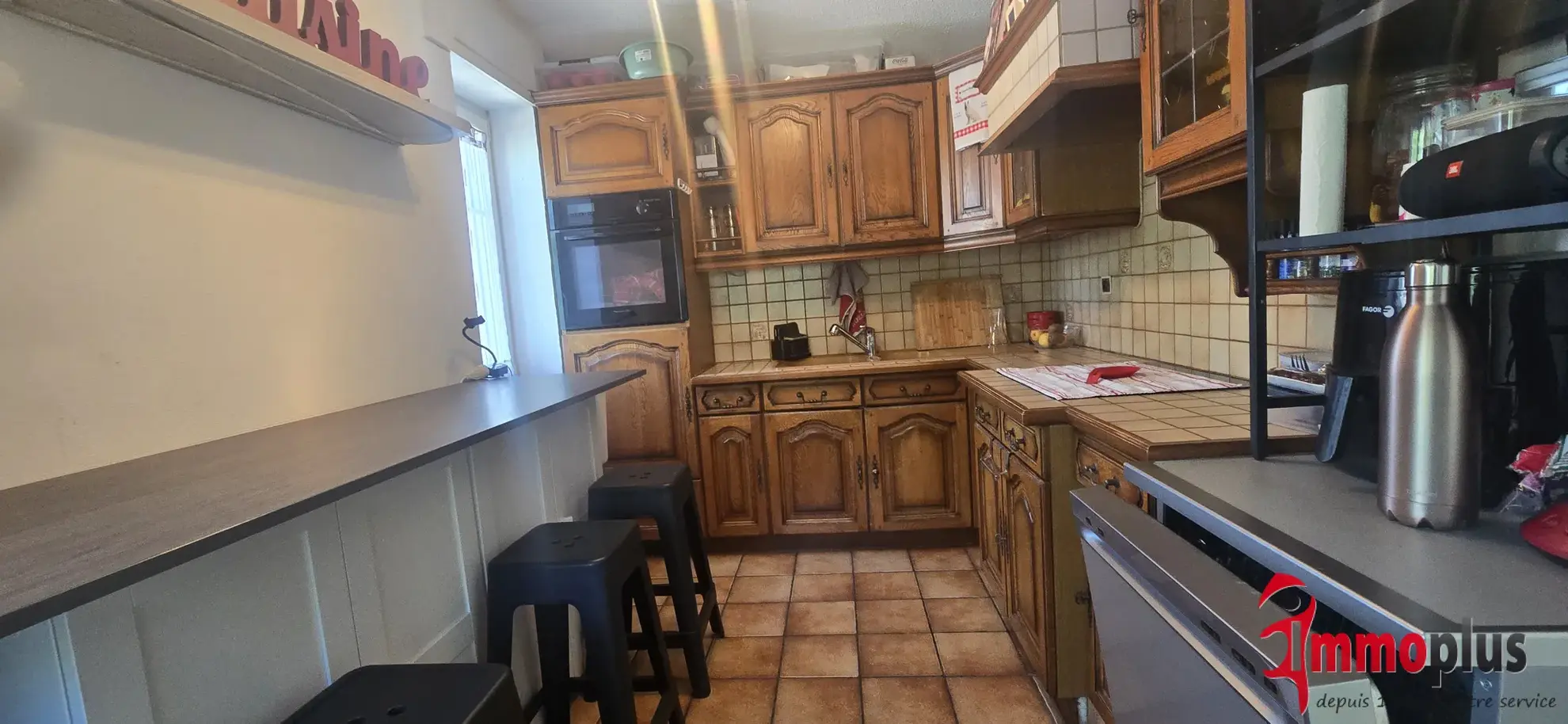 Opportunité d'investissement à Bartenheim : immeuble avec appartement et local commercial loués 