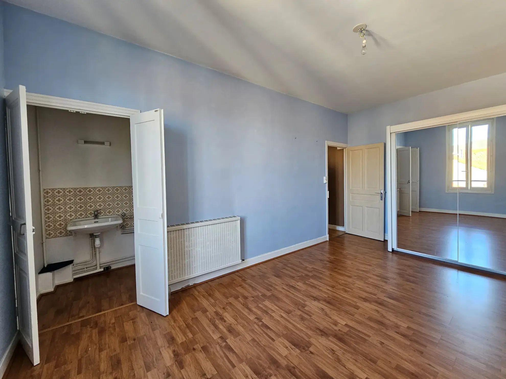 Appartement triplex à Clermont-Ferrand avec balcon et stationnement 