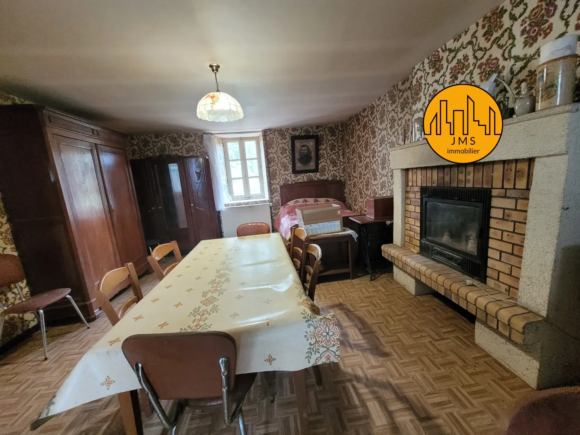 Ensemble immobilier à Saint Sornin avec maison, grange et dépendances 