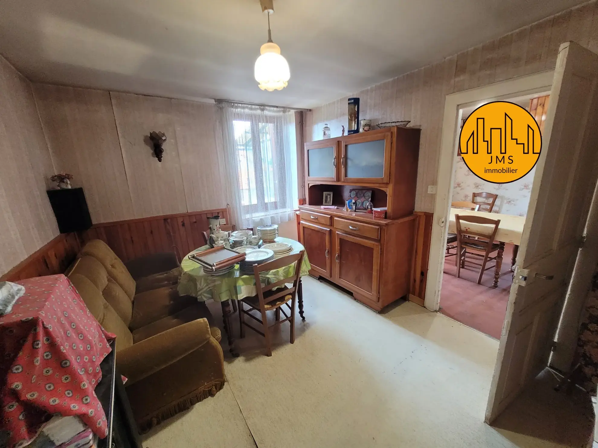 Ensemble immobilier à Saint Sornin avec maison, grange et dépendances 