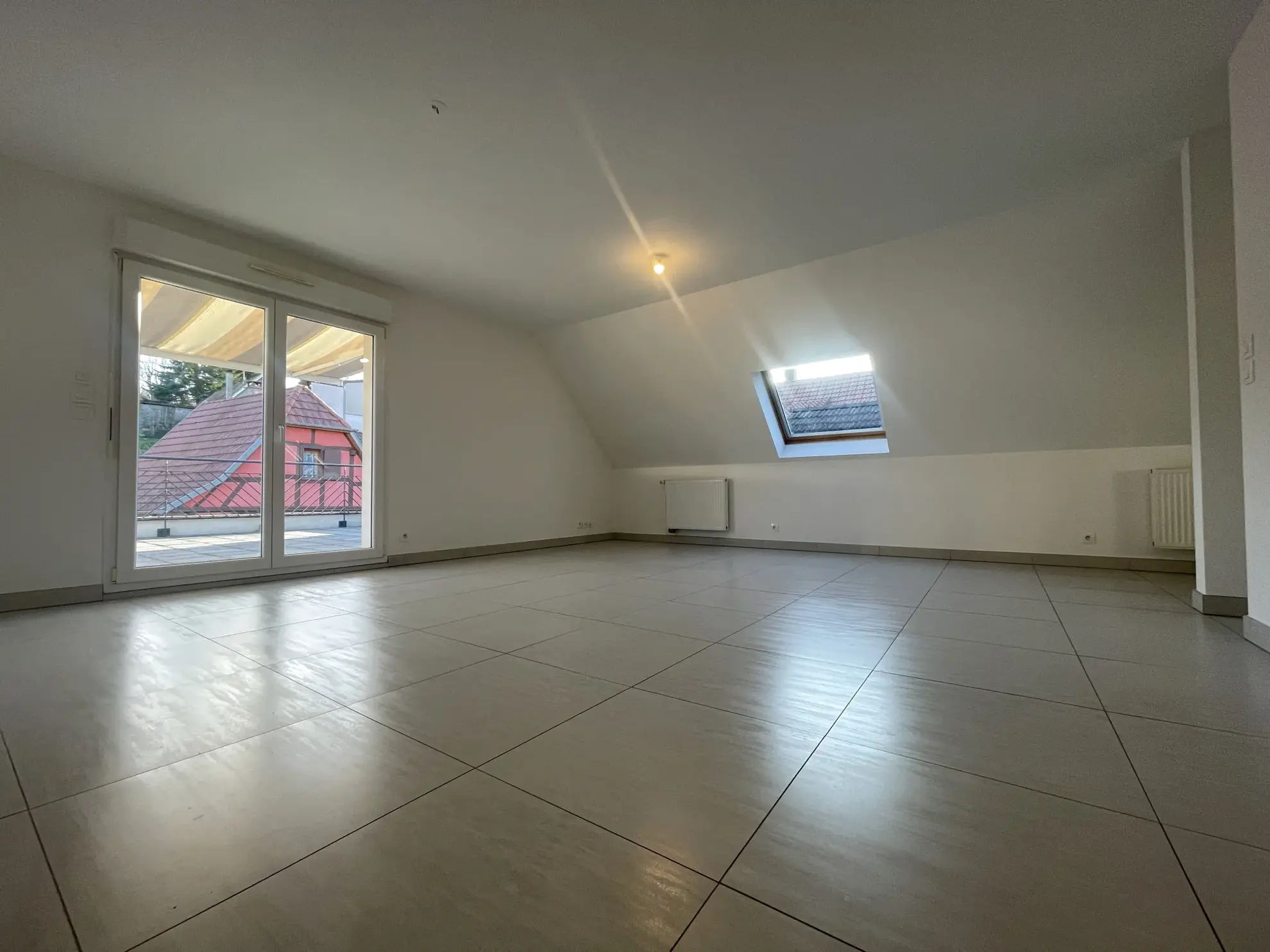 Appartement T3 avec terrasse de 45 m² à Bartenheim - Exclu Immobilier 