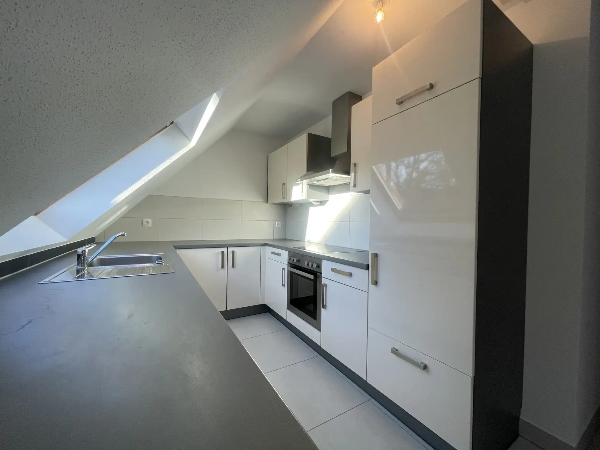 Appartement T3 avec terrasse de 45 m² à Bartenheim - Exclu Immobilier 