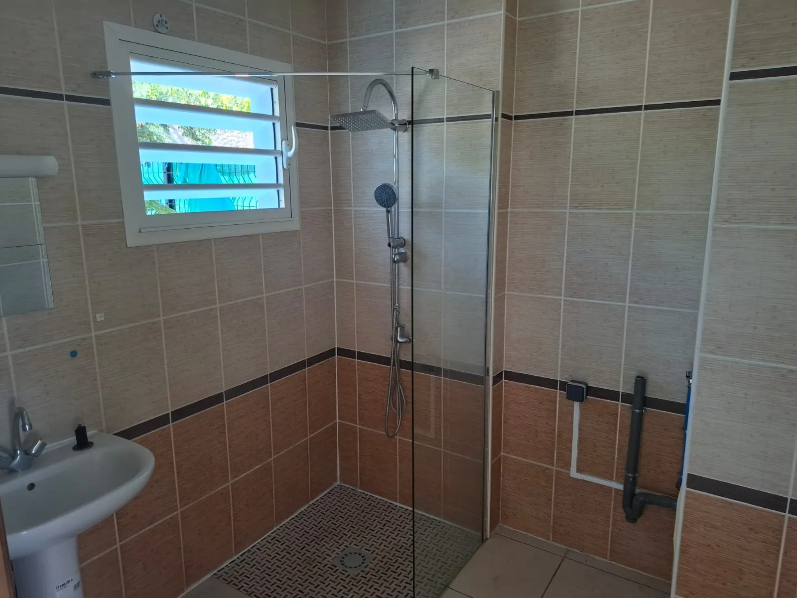 Maison mitoyenne à vendre à La Possession avec vue mer – 3 chambres et terrasse 