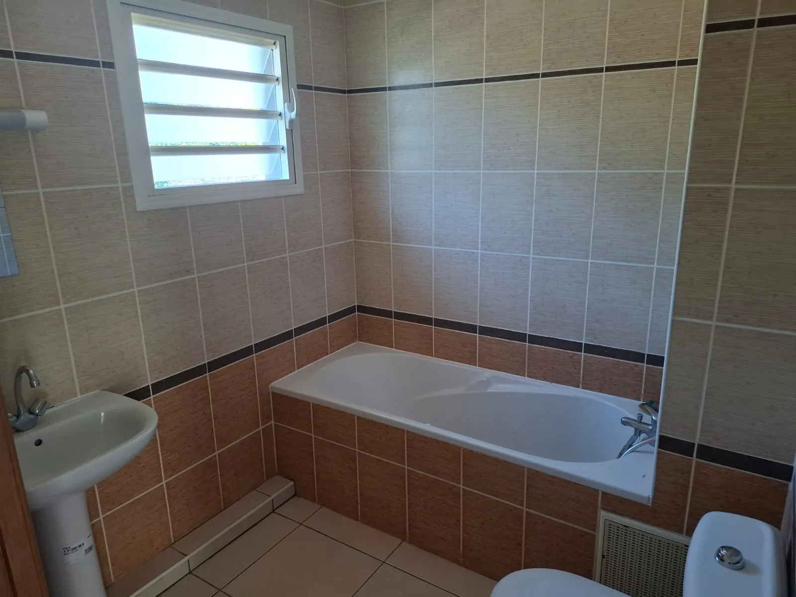 Maison mitoyenne à vendre à La Possession avec vue mer – 3 chambres et terrasse 