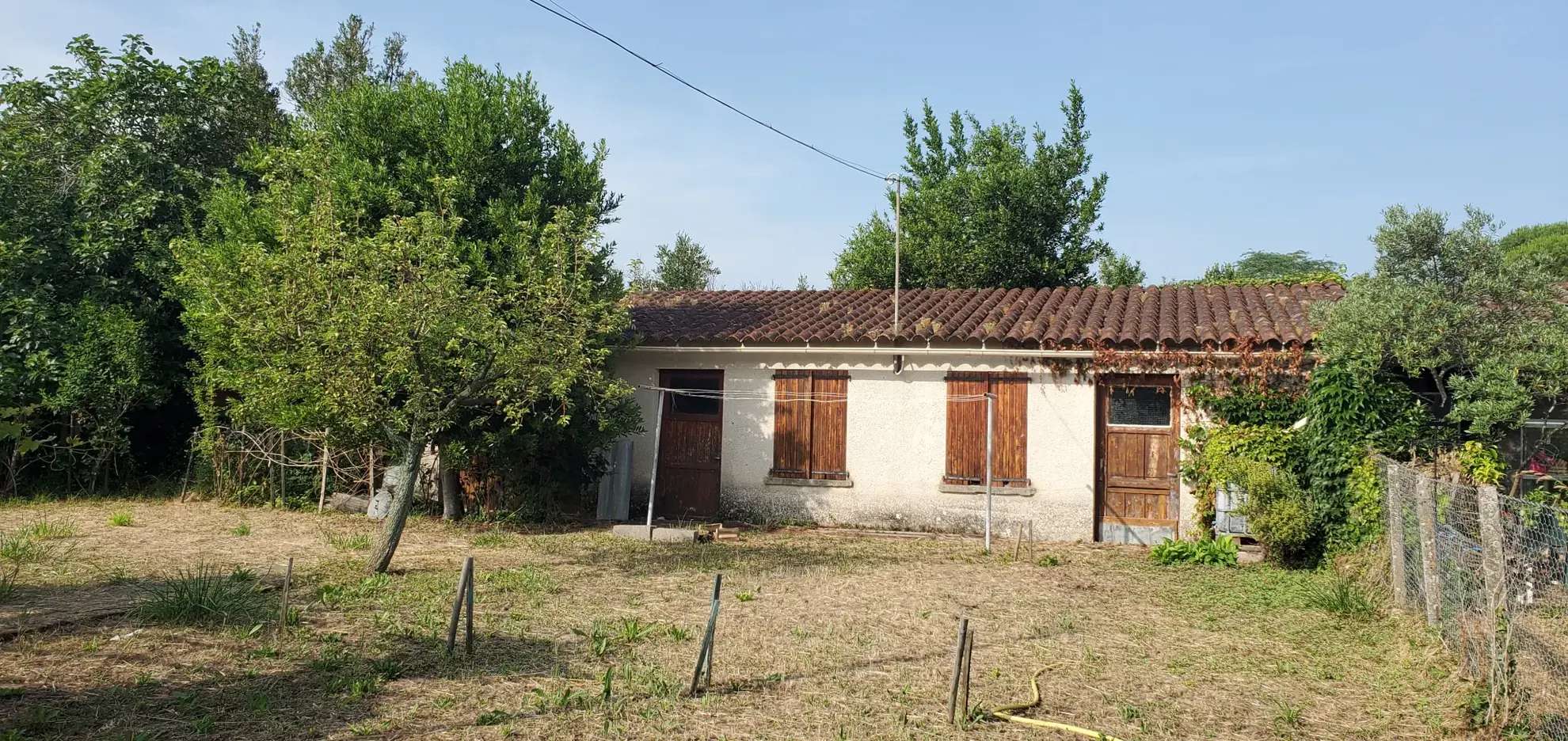 Maison mitoyenne à Gaillac avec terrain et dépendance - Centre-ville 