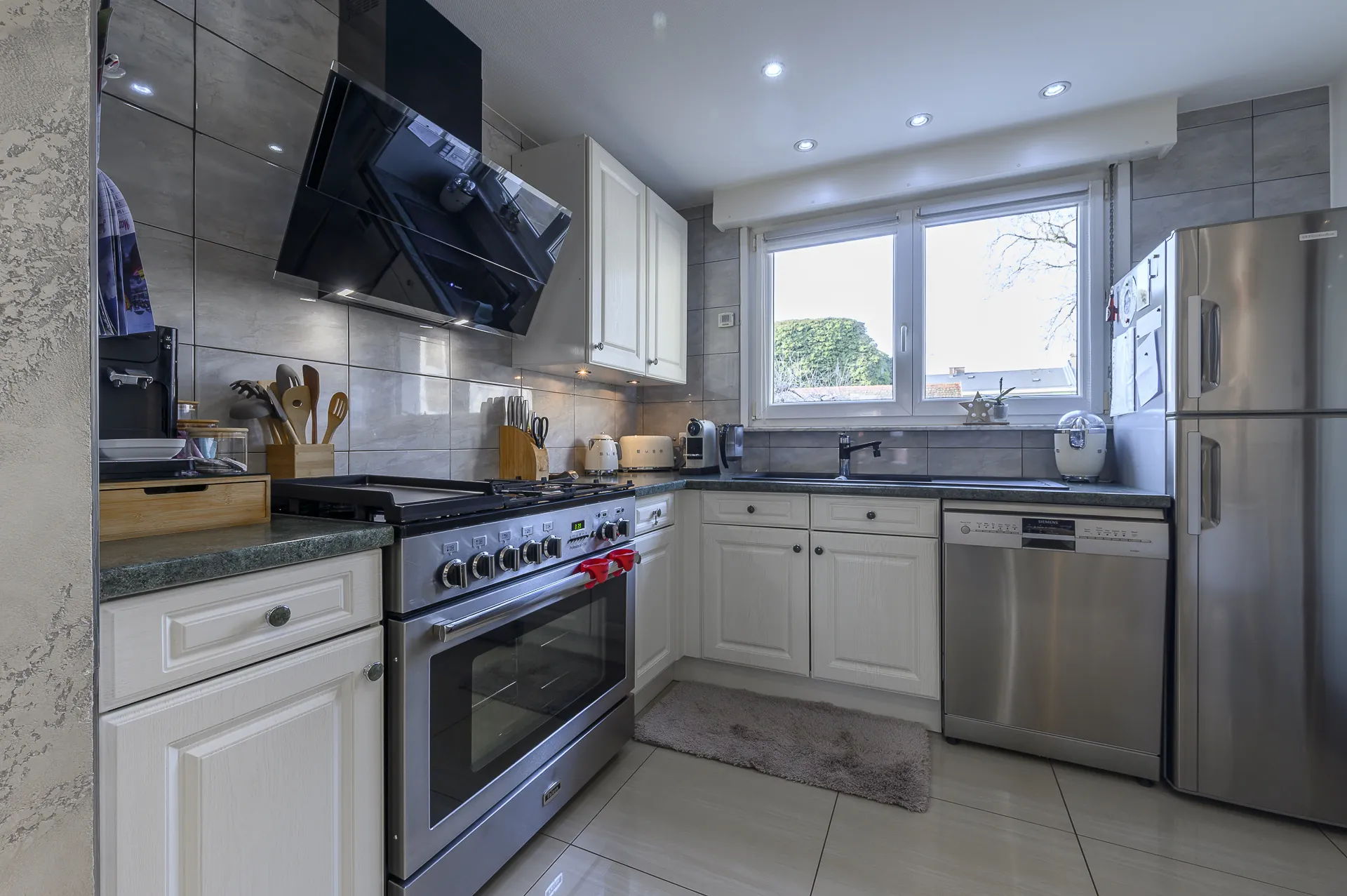 Appartement 5 pièces à Strasbourg Neuhof Village avec balcon, cave et garage 