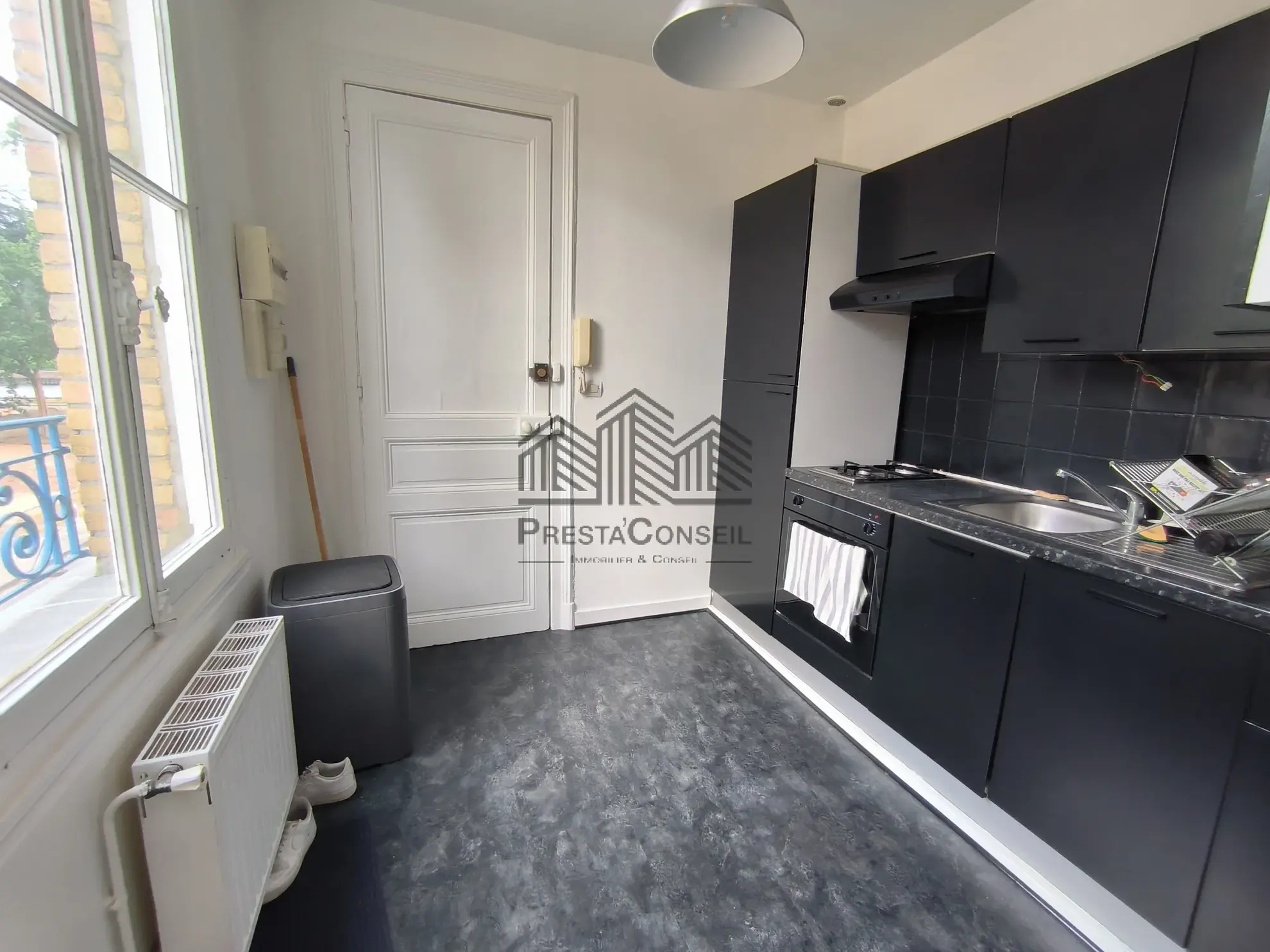 Appartement haussmannien de 91 m² en centre-ville d'Elbeuf à vendre 