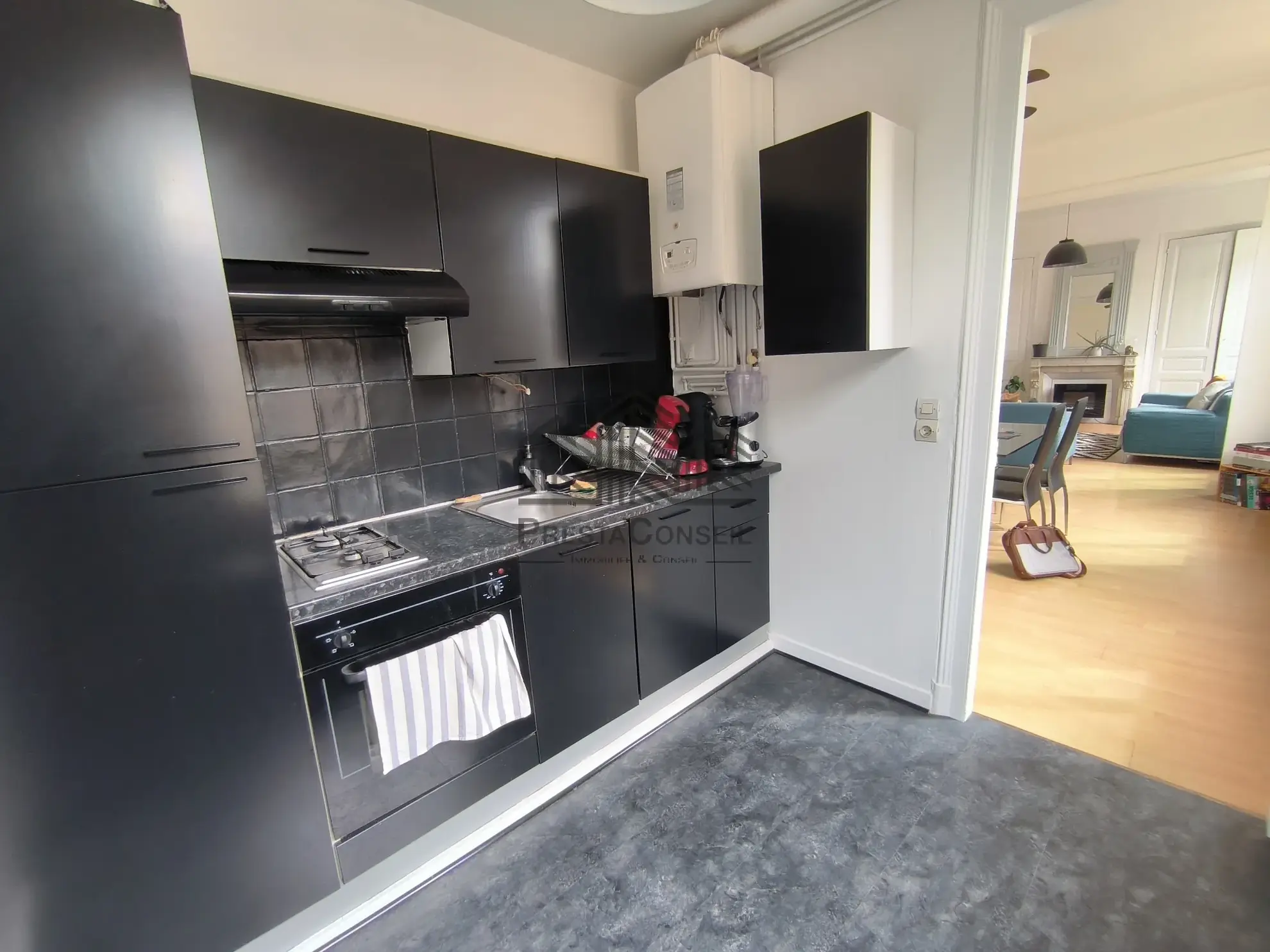 Appartement haussmannien de 91 m² en centre-ville d'Elbeuf à vendre 