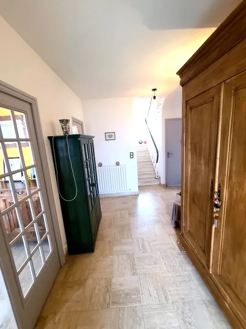 Maison familiale rénovée à Bourg Blanc avec grand terrain et panneaux solaires 