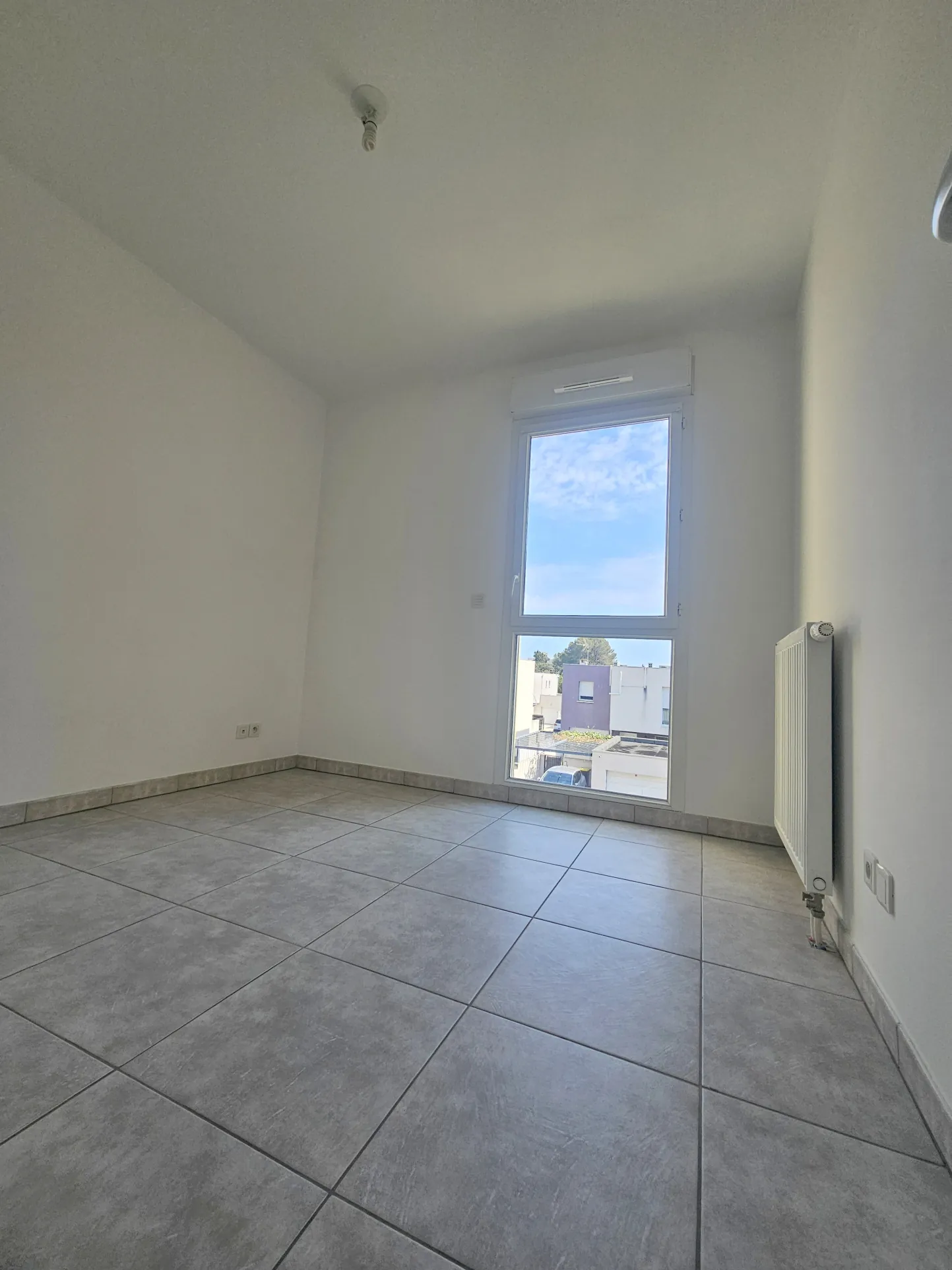 Appartement F3 avec terrasse et parking à Juvignac – Loi Pinel possible