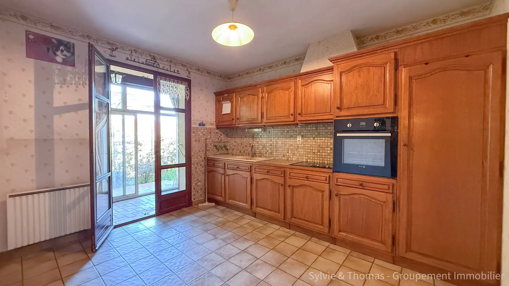 Maison de plain-pied à Orange avec jardin, garage et veranda - 80 m² 