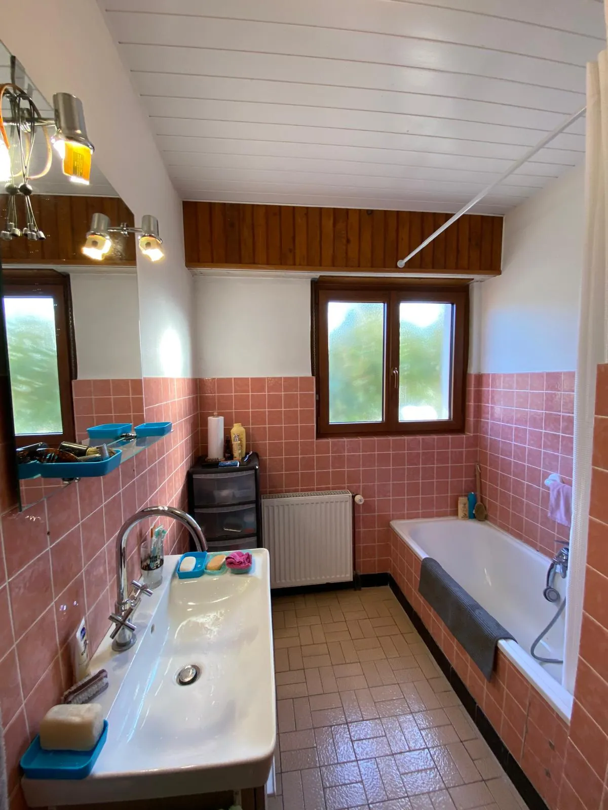 Maison de plain-pied à Bartenheim de 80 m² avec terrain arboré et potentiel à saisir 