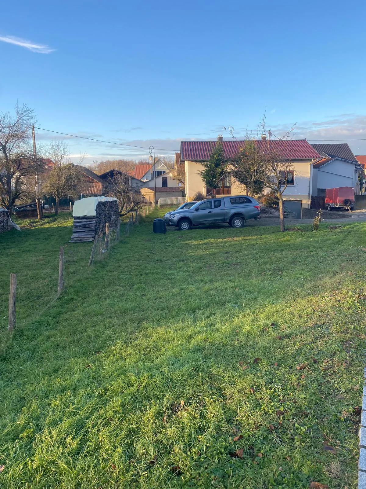 Maison de plain-pied à Bartenheim de 80 m² avec terrain arboré et potentiel à saisir 