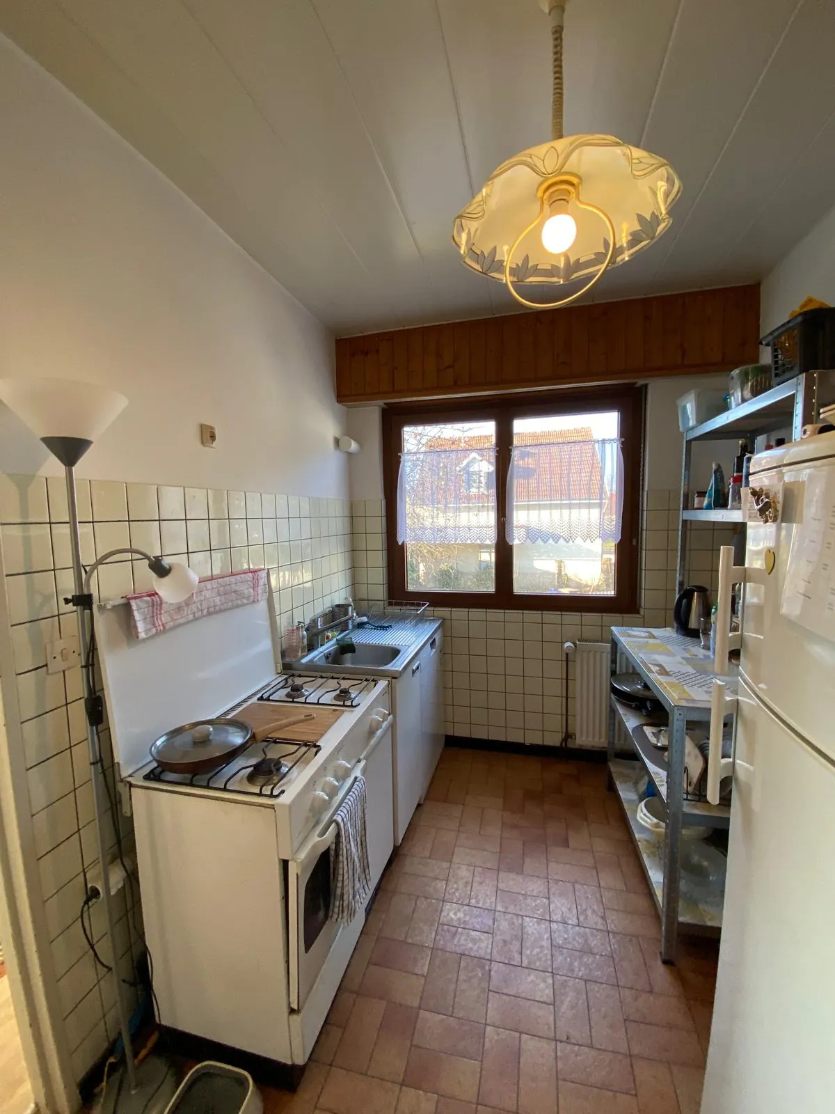 Maison de plain-pied à Bartenheim de 80 m² avec terrain arboré et potentiel à saisir 