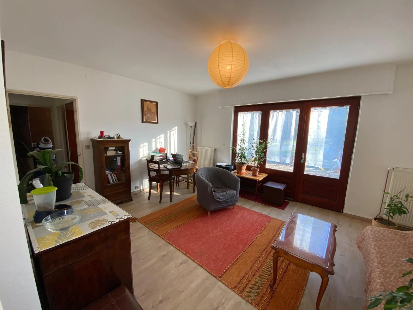 Maison de plain-pied à Bartenheim de 80 m² avec terrain arboré et potentiel à saisir 