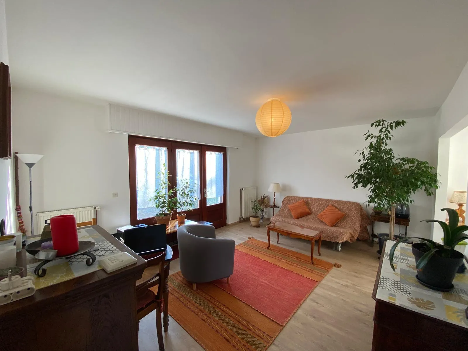 Maison de plain-pied à Bartenheim de 80 m² avec terrain arboré et potentiel à saisir 