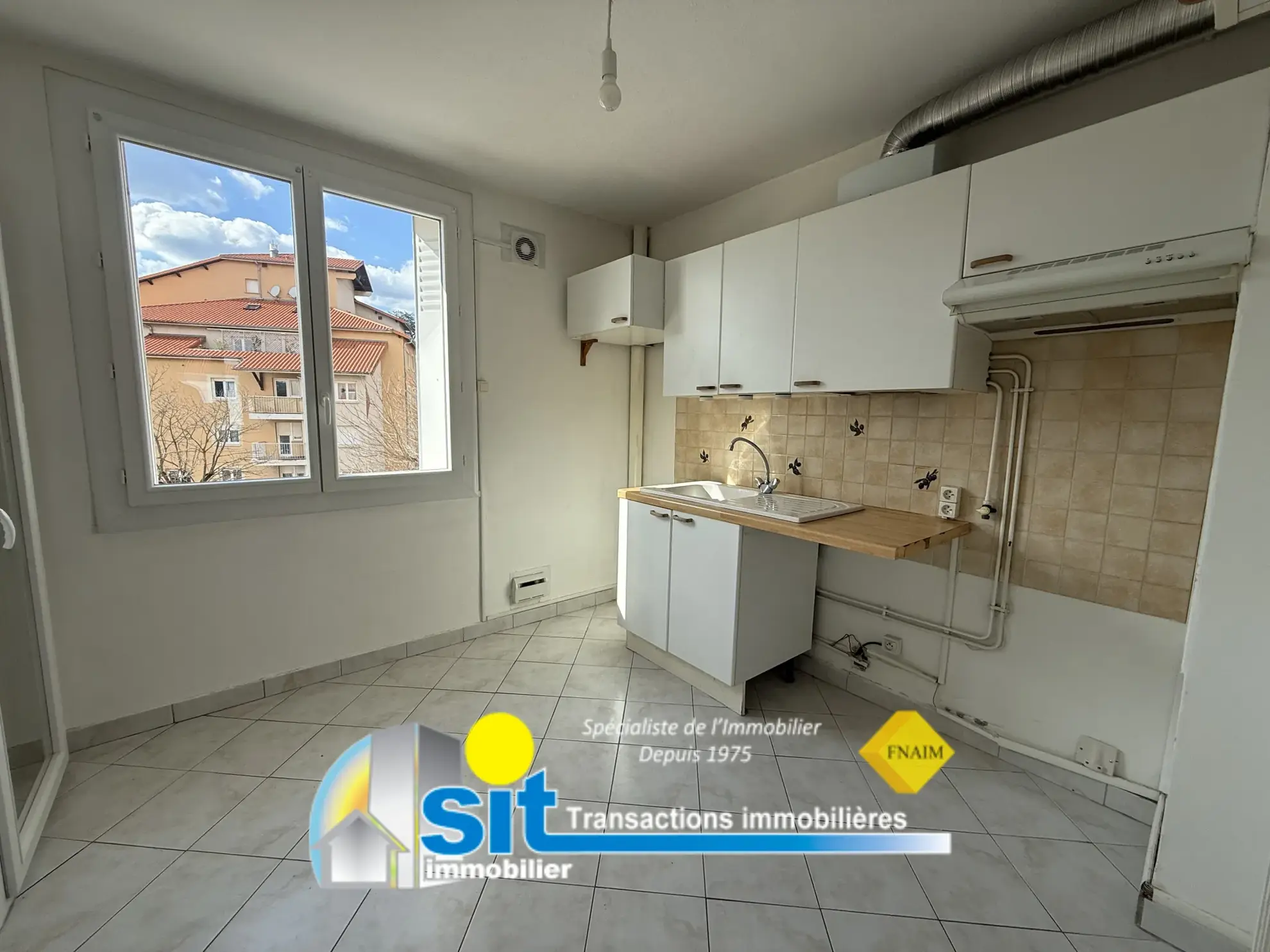 Appartement 3 pièces avec balcon et cave à Vienne dans résidence sécurisée 