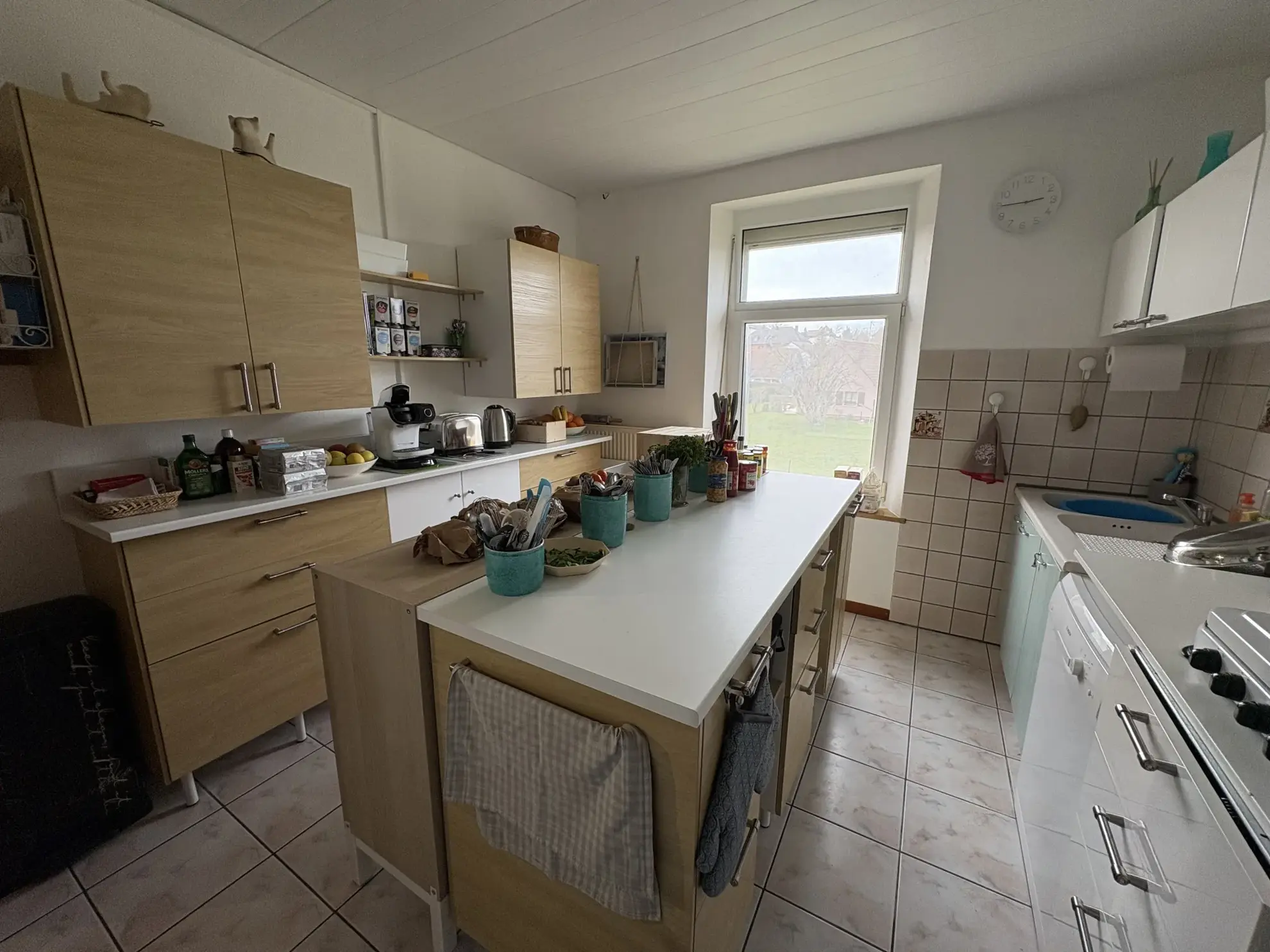 Immeuble de rapport à Pfetterhouse proche de la frontière suisse avec 3 logements loués 