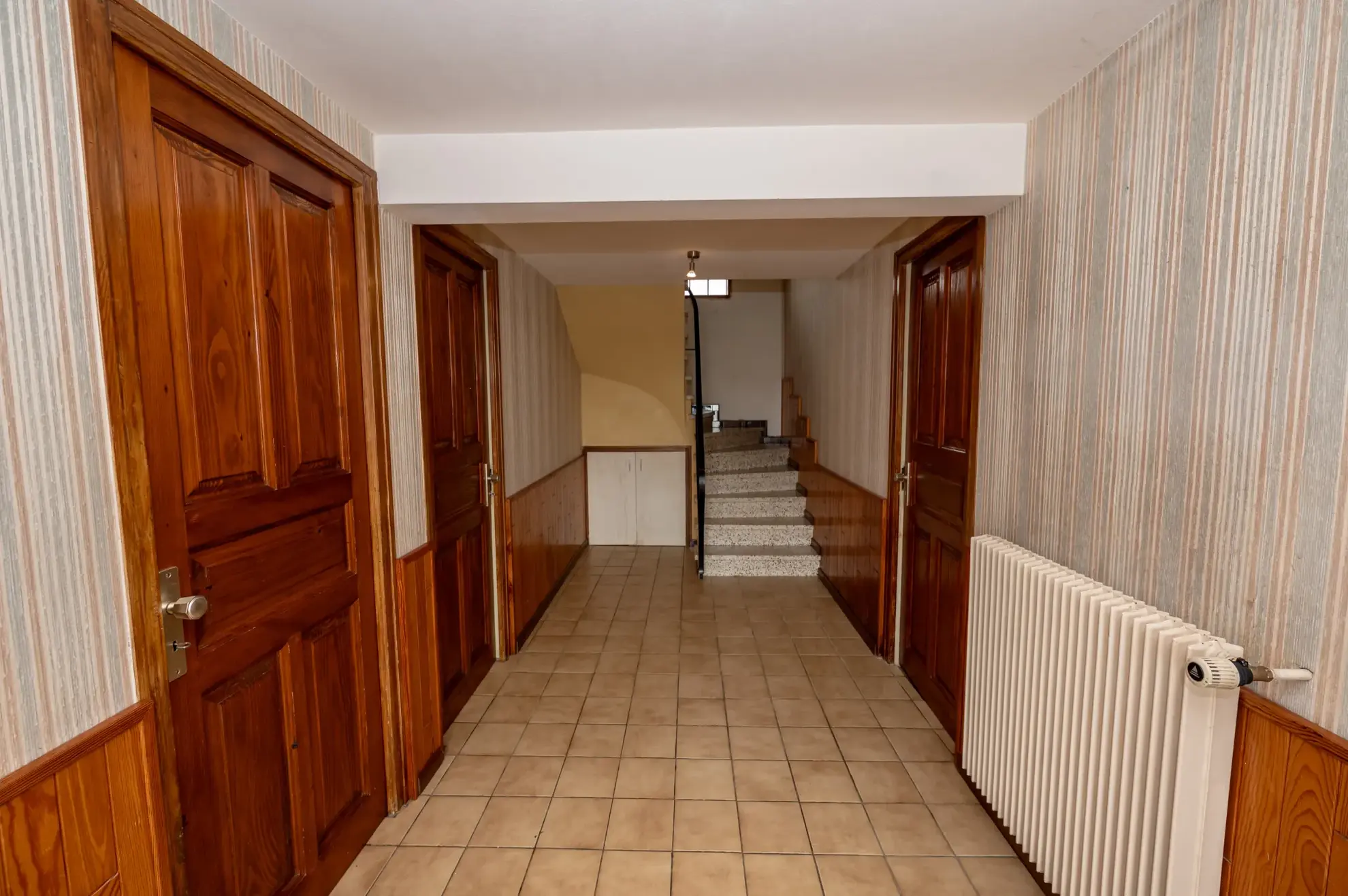 Maison individuelle avec 6 pièces à Courvieres, secteur calme, à rafraîchir 