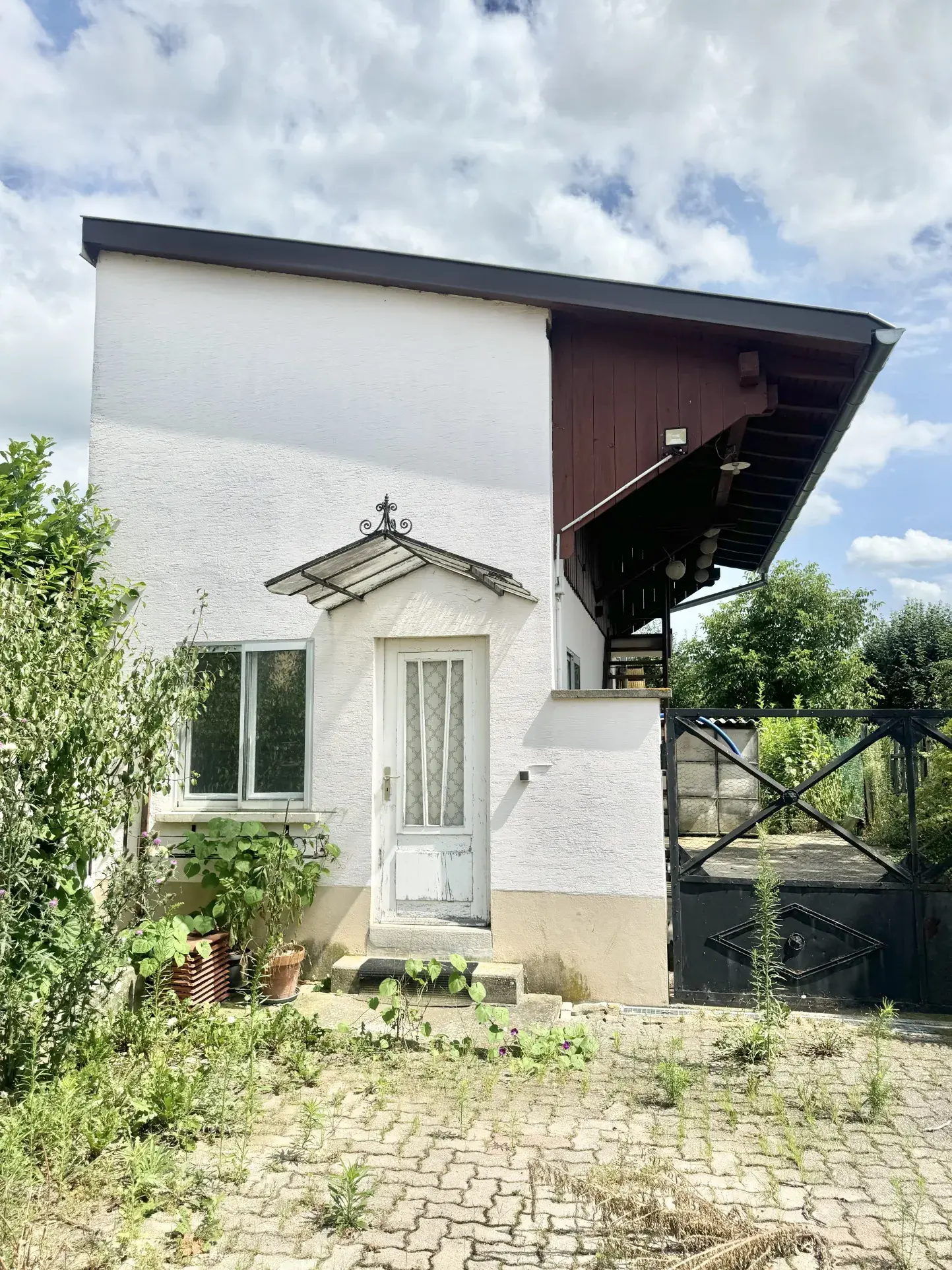 Vente de deux maisons et terrain constructible à Guebwiller, secteur bucolique 