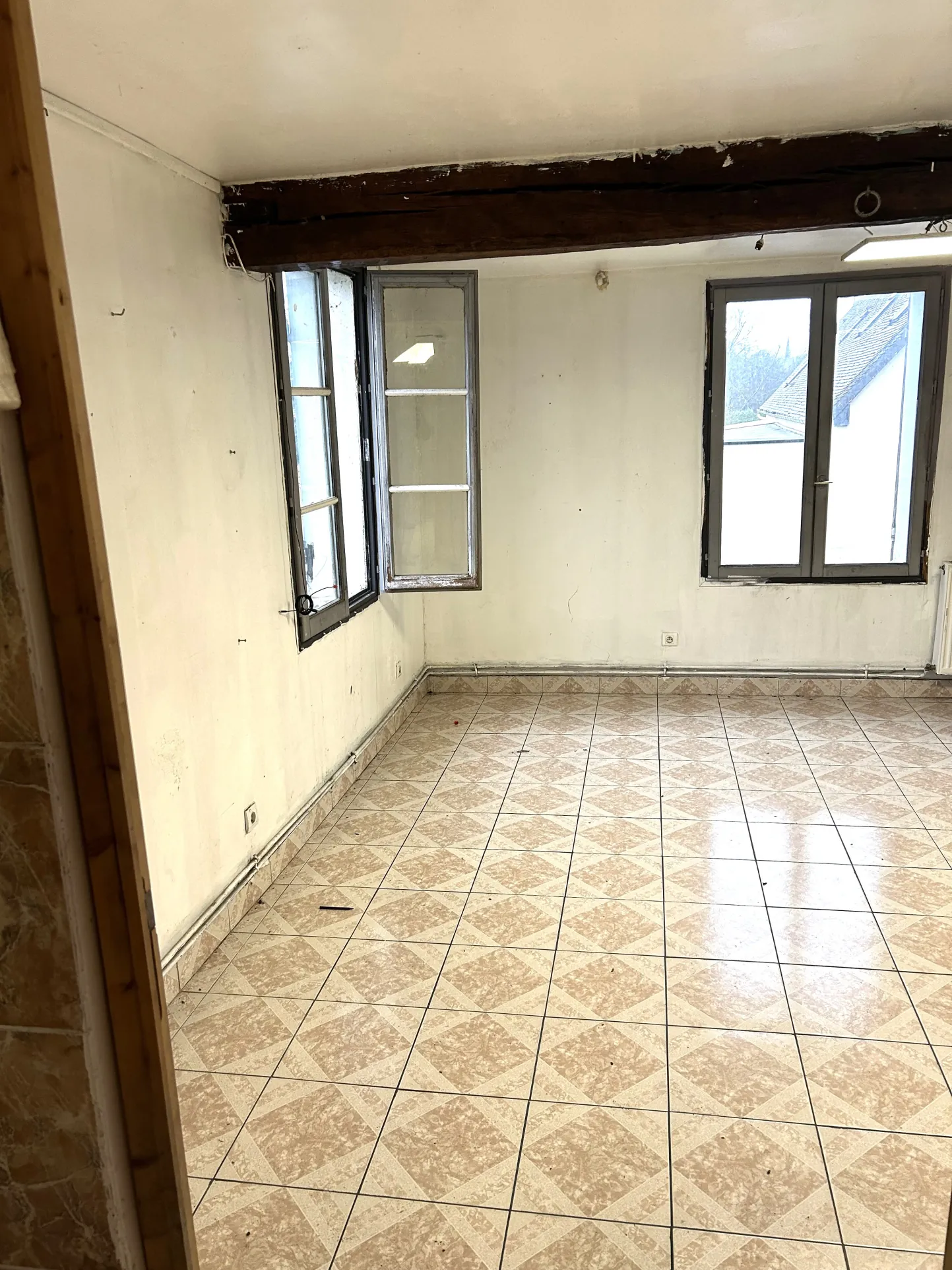 Maison à rénover à Gisors - Terrain de 367 m², proche gare, idéal investisseur 