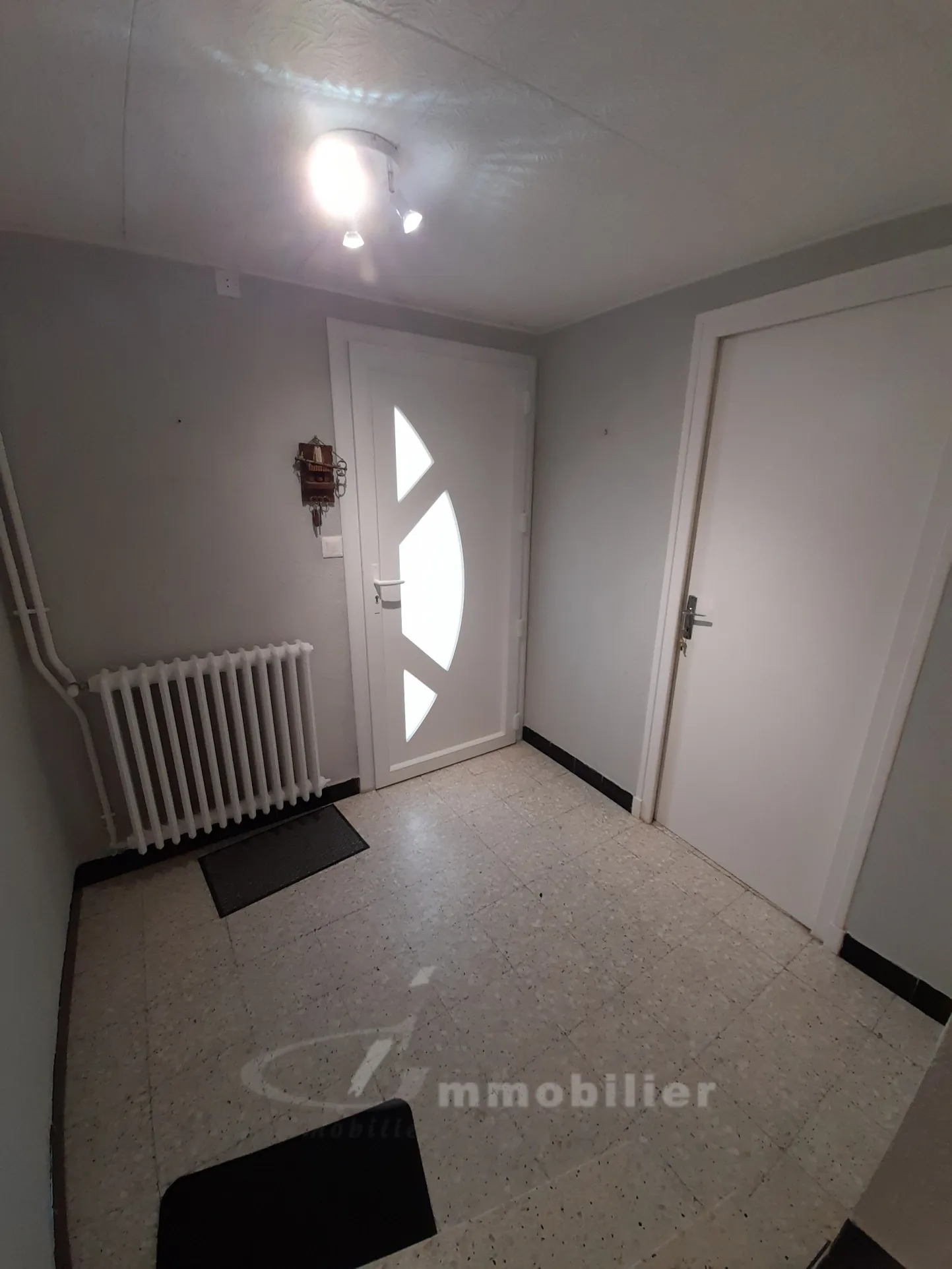À vendre maison de 123 m² avec garage et terrain clos à Romans-sur-Isère 