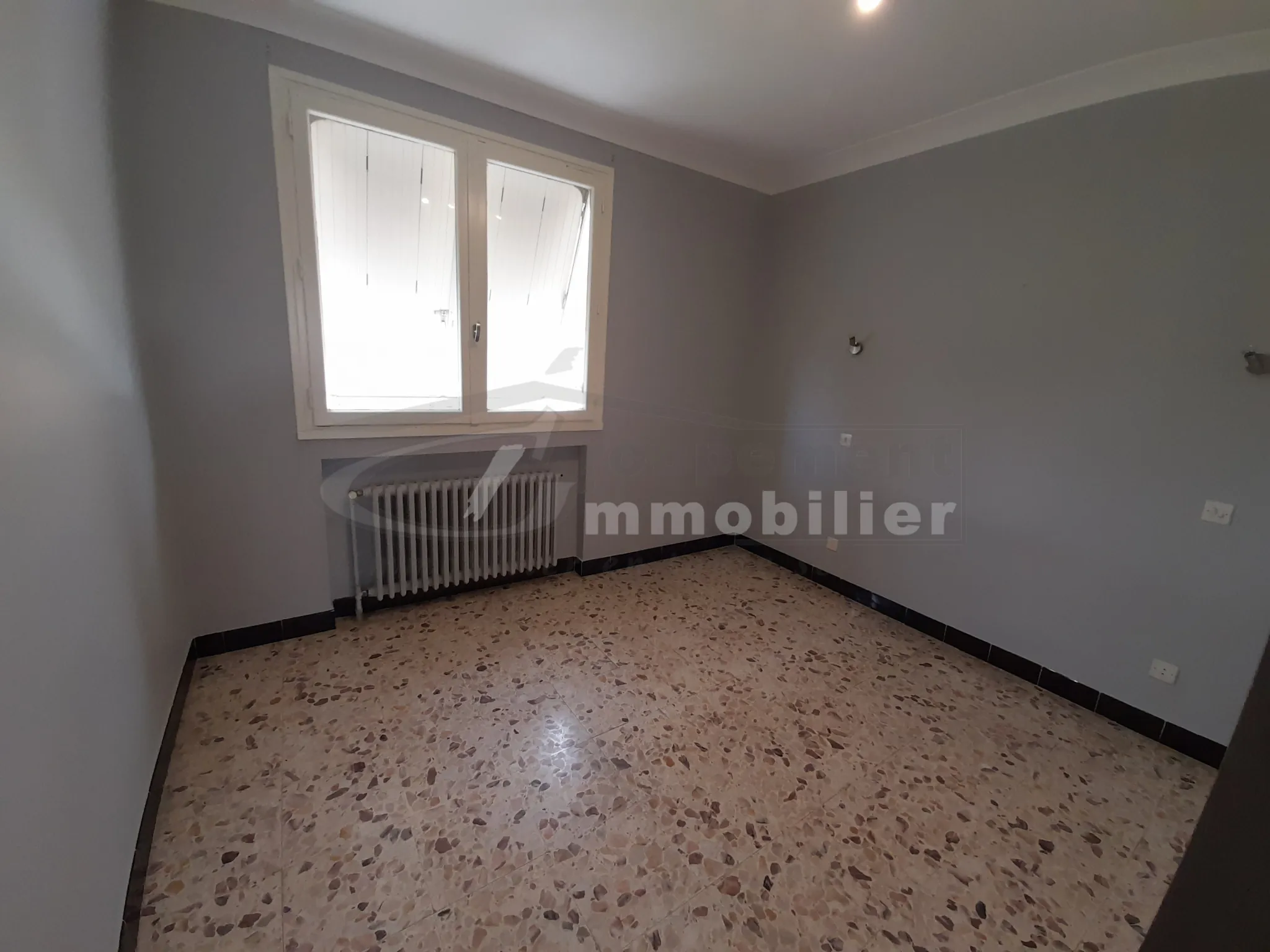 À vendre maison de 123 m² avec garage et terrain clos à Romans-sur-Isère 