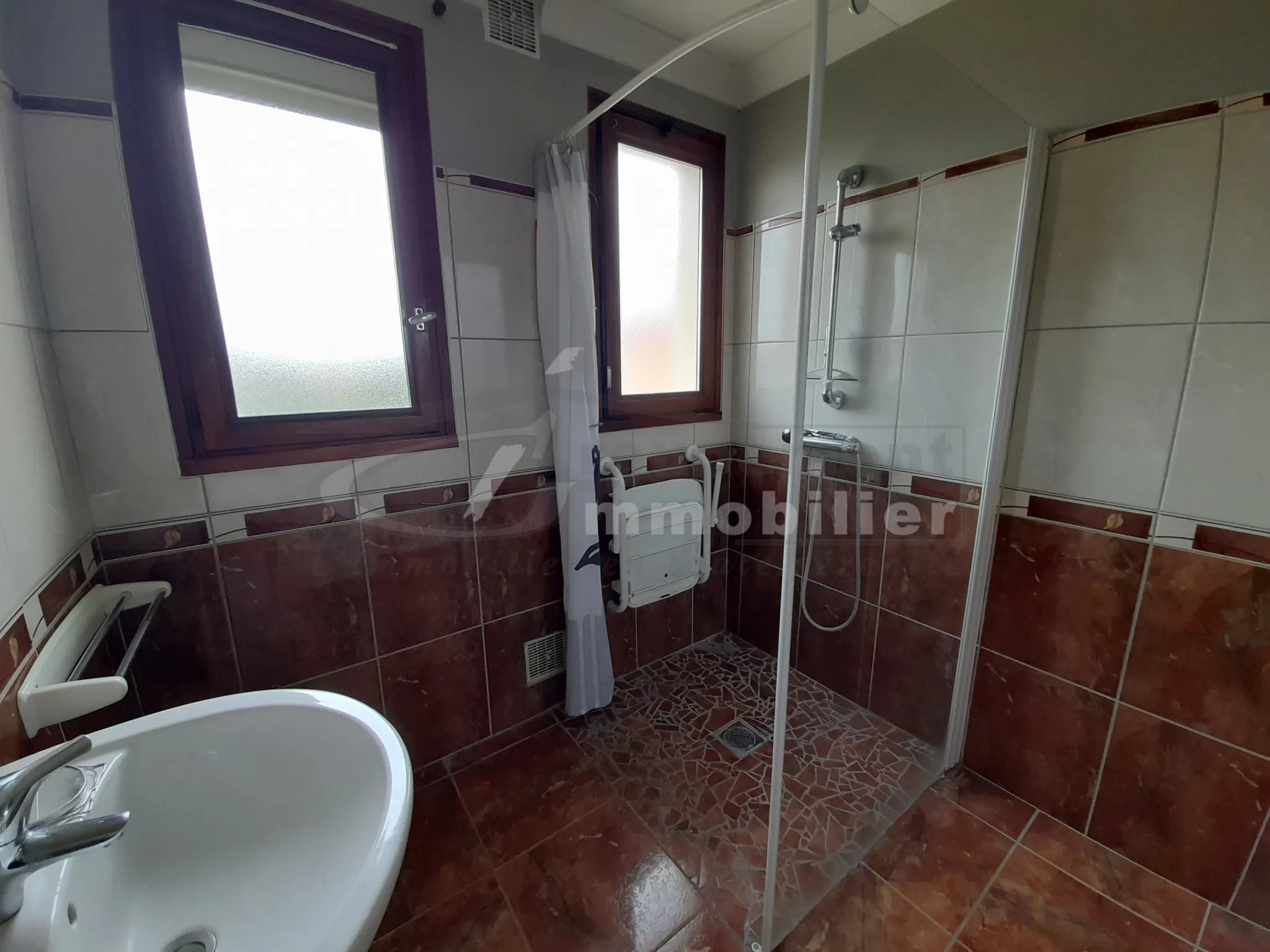 À vendre maison de 123 m² avec garage et terrain clos à Romans-sur-Isère 