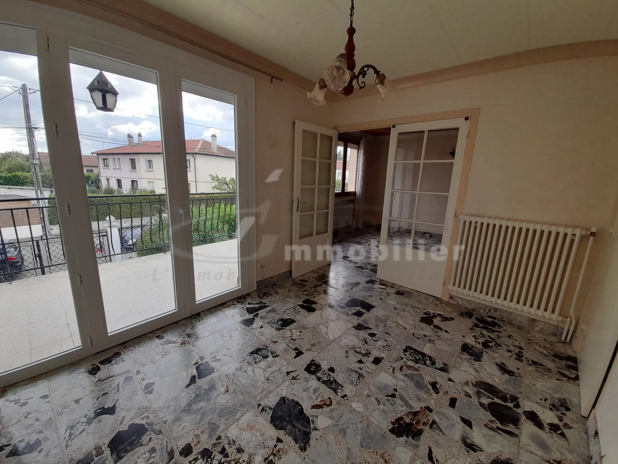 À vendre maison de 123 m² avec garage et terrain clos à Romans-sur-Isère 