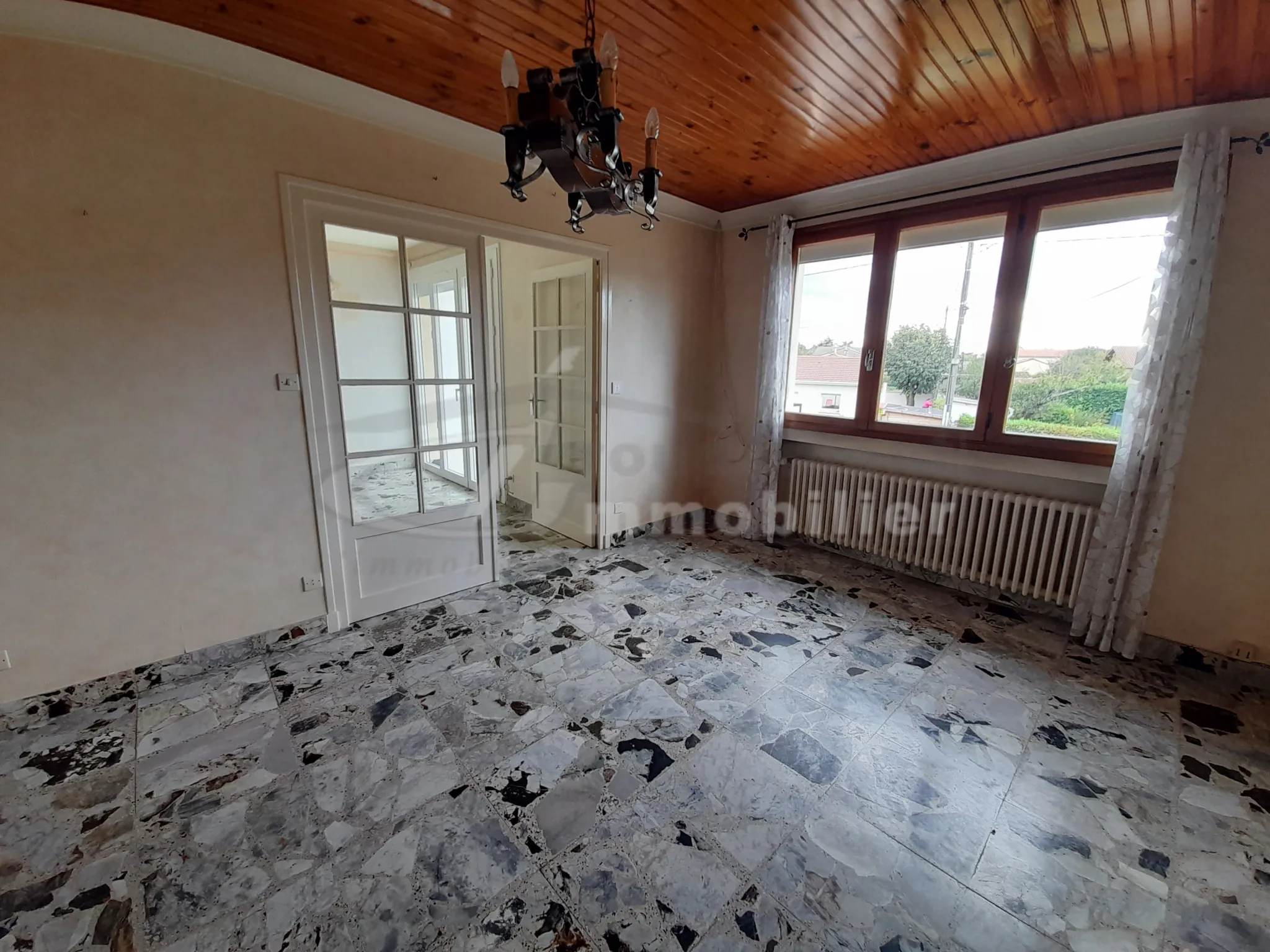 À vendre maison de 123 m² avec garage et terrain clos à Romans-sur-Isère 