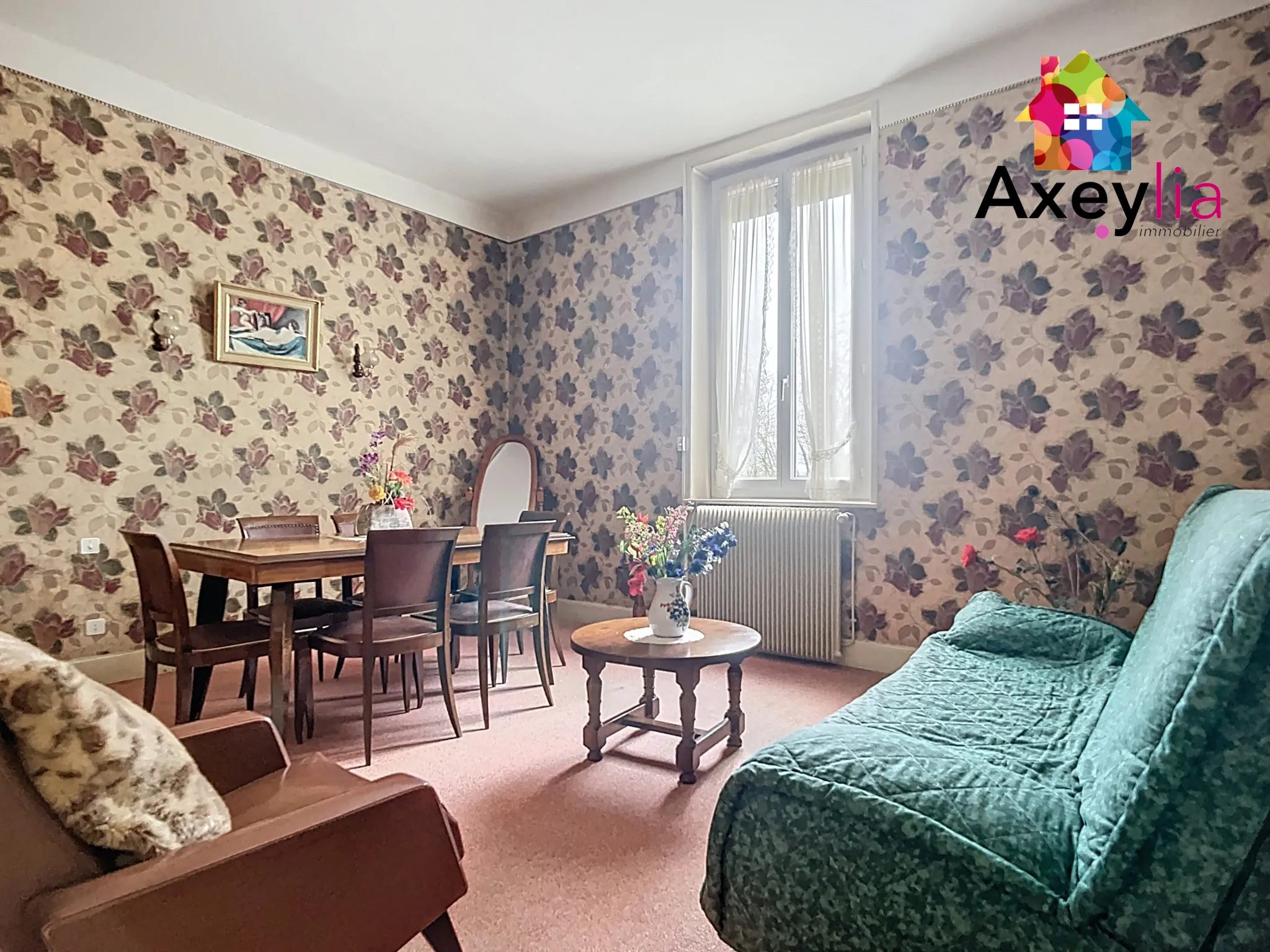 Maison à Roanne avec 2 chambres, garage et terrain de 312 m²