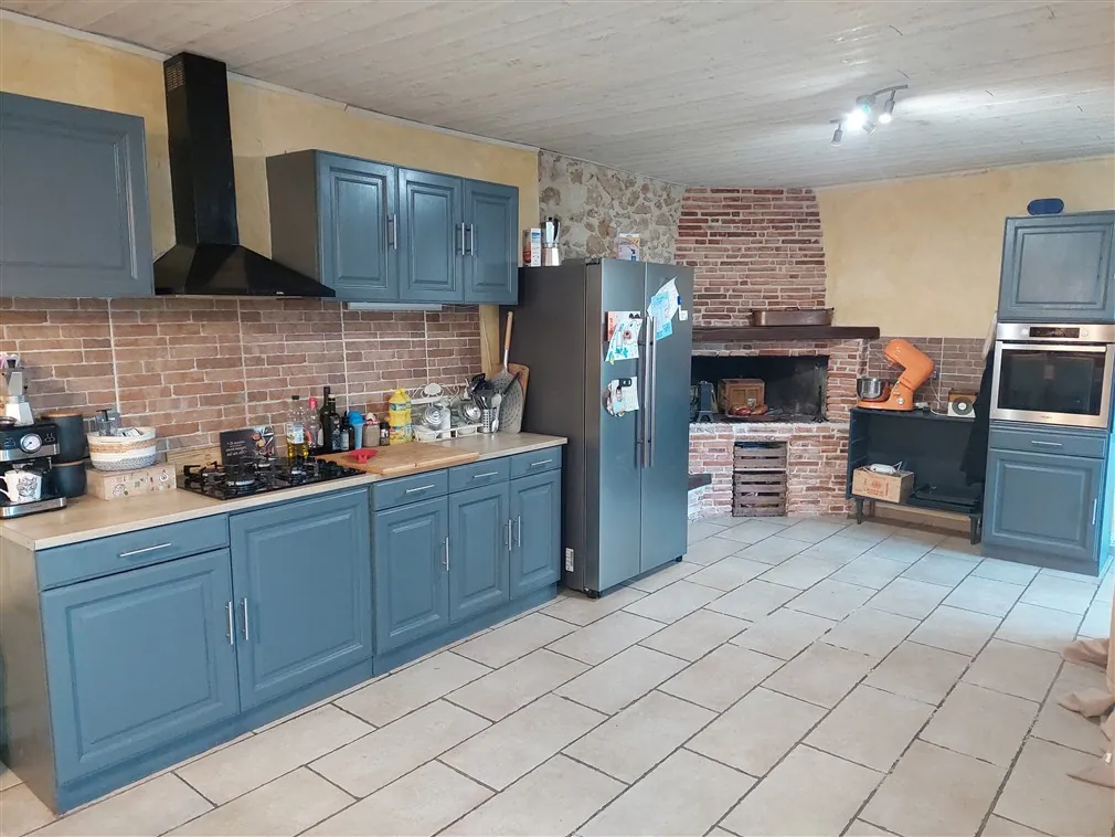 Maison en pierre de 174 m² avec grand garage et jardin proche Langon 